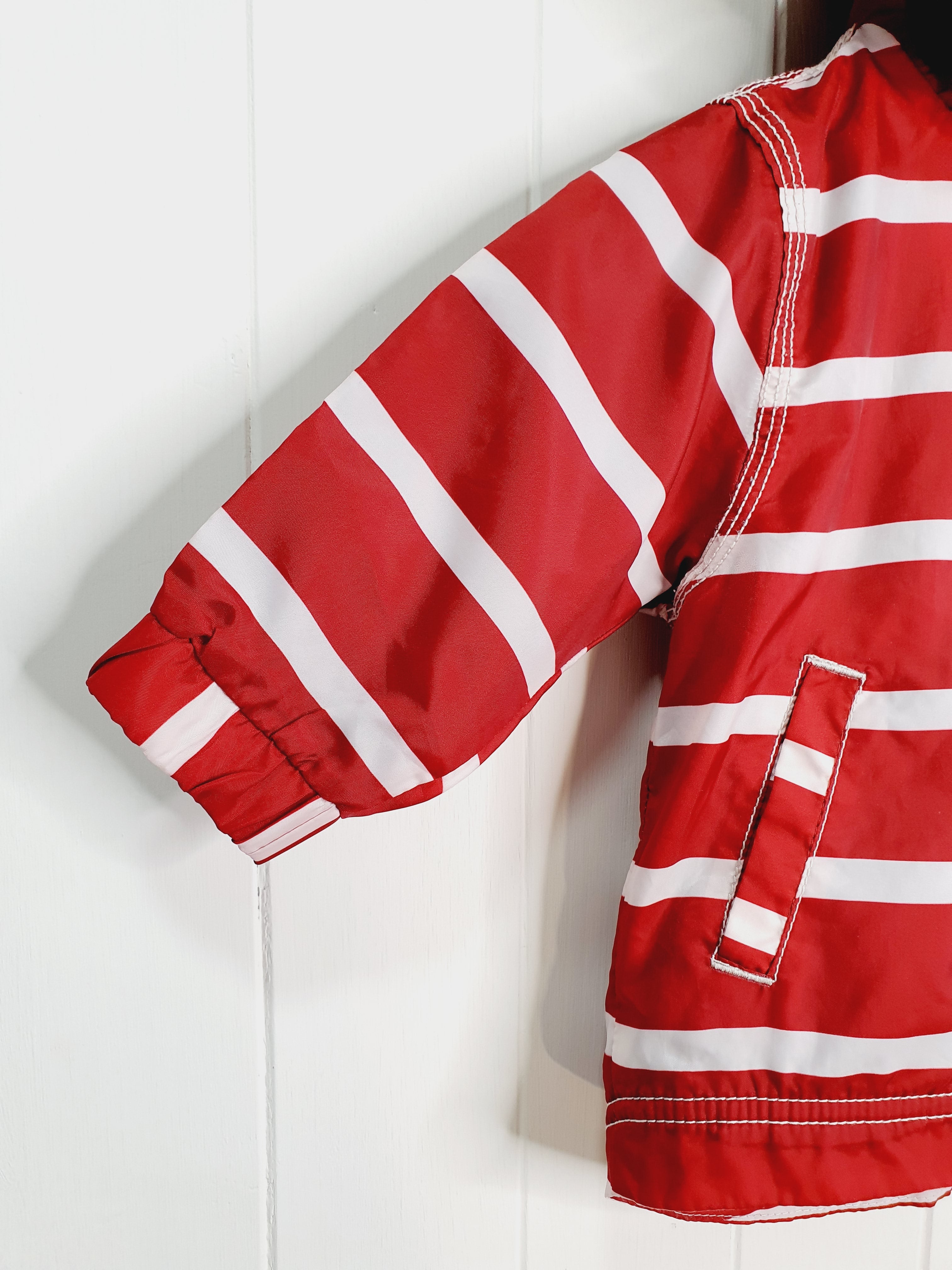 Next red and white stripy shower resistant wind proof jacket 6-9 months