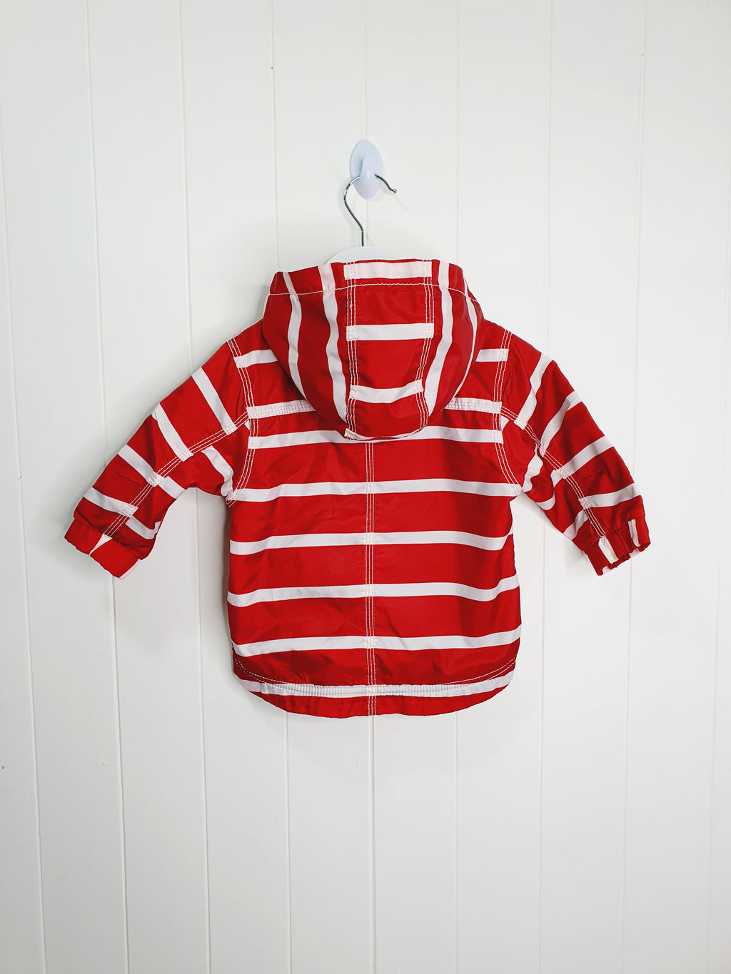 Next red and white stripy shower resistant wind proof jacket 6-9 months