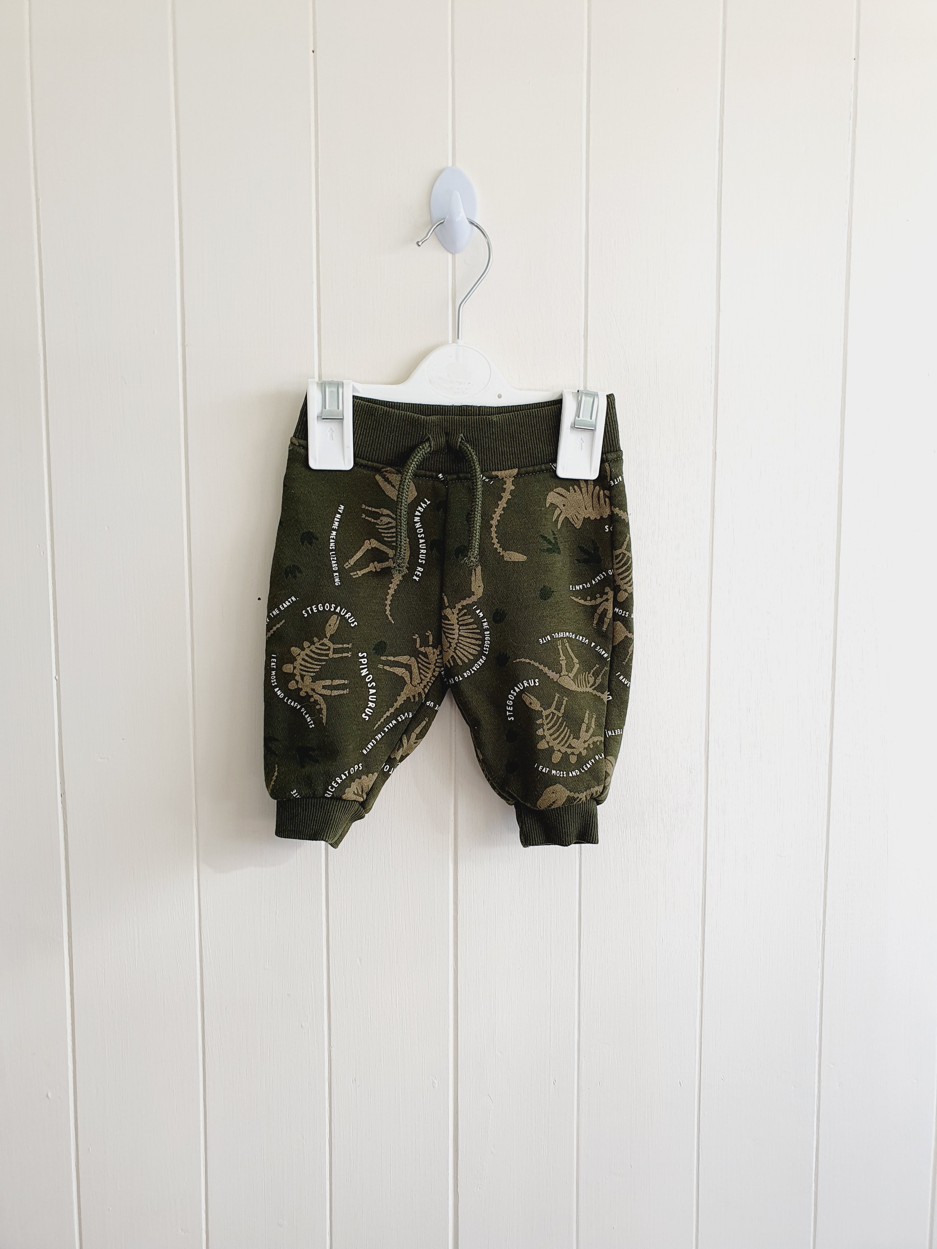 Primark khaki dinosaur skeleton joggers 0-3 months