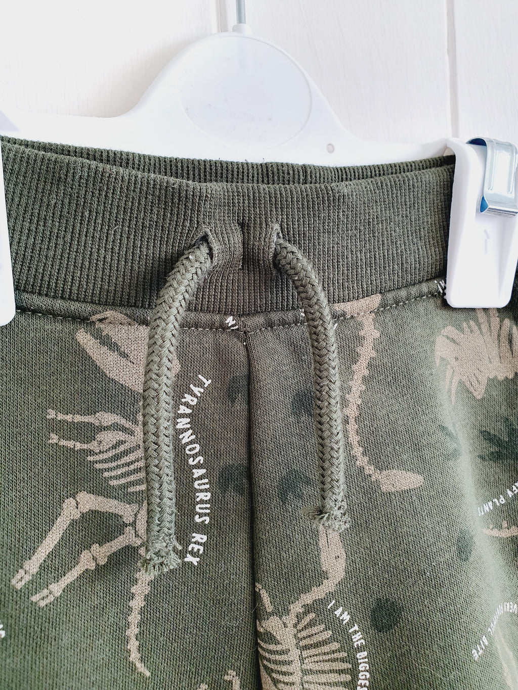 Primark khaki dinosaur skeleton joggers 0-3 months