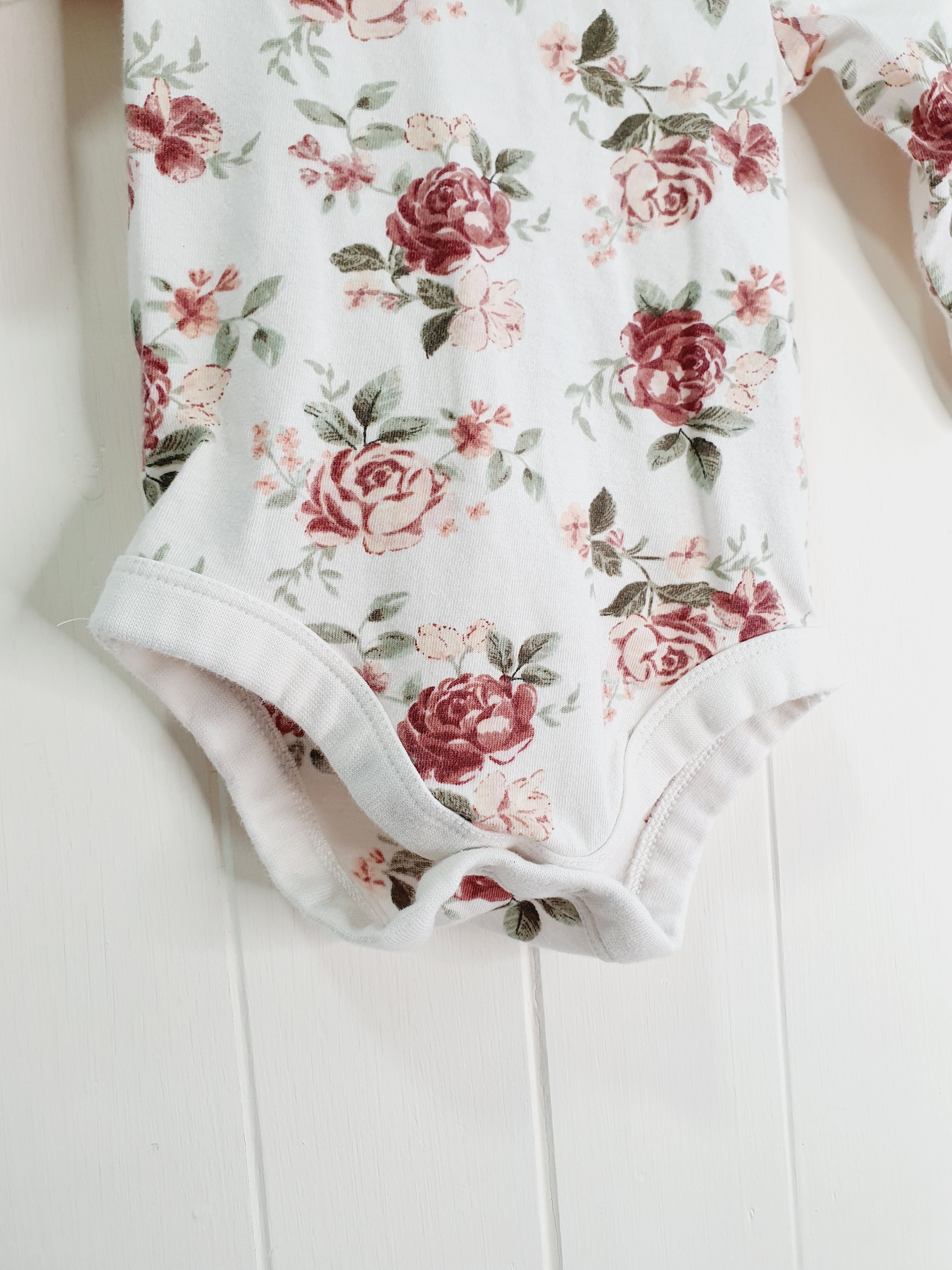 TU floral long sleeve bodysuit 0-3 months