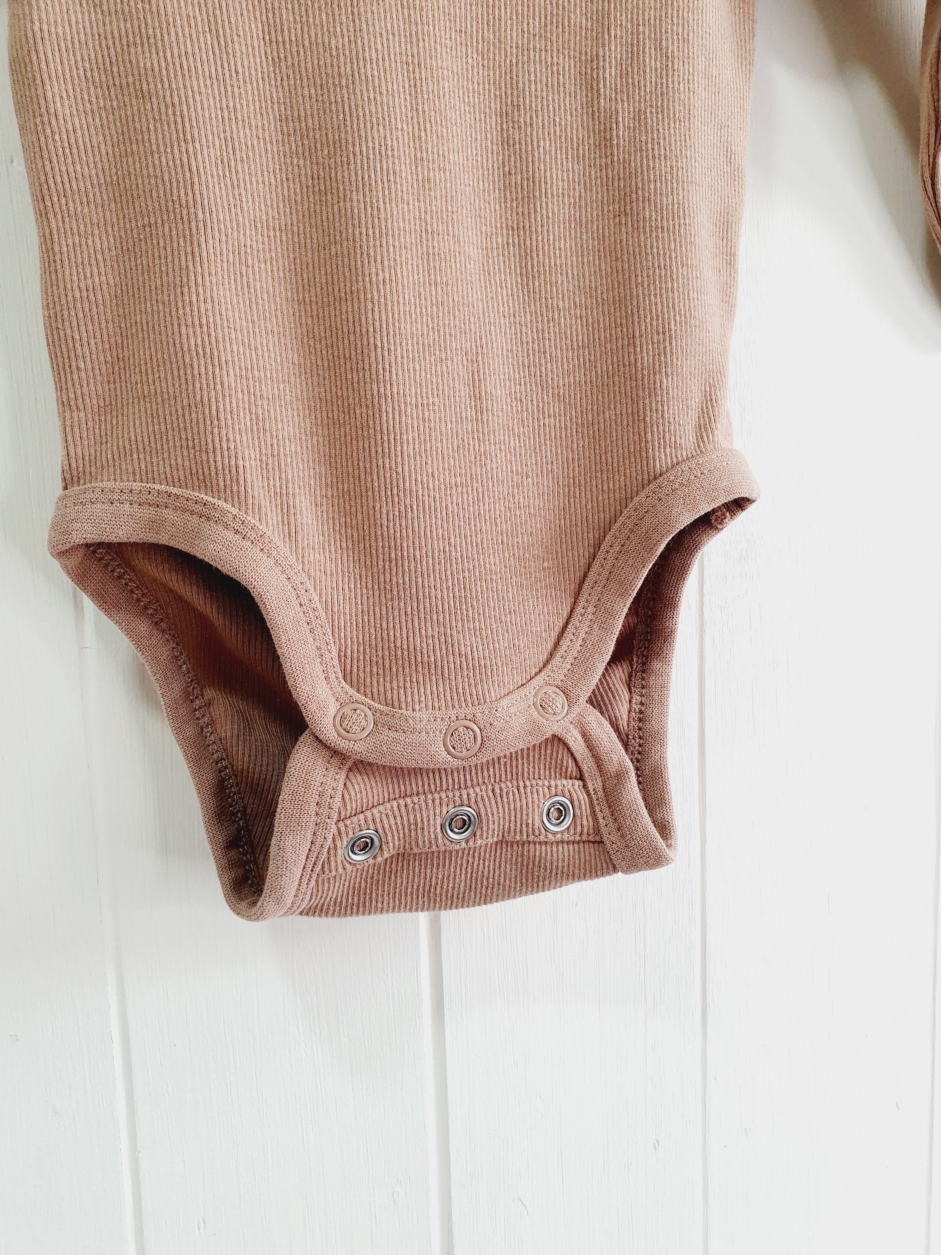 H&M brown long sleeve bodysuit 2-4 months