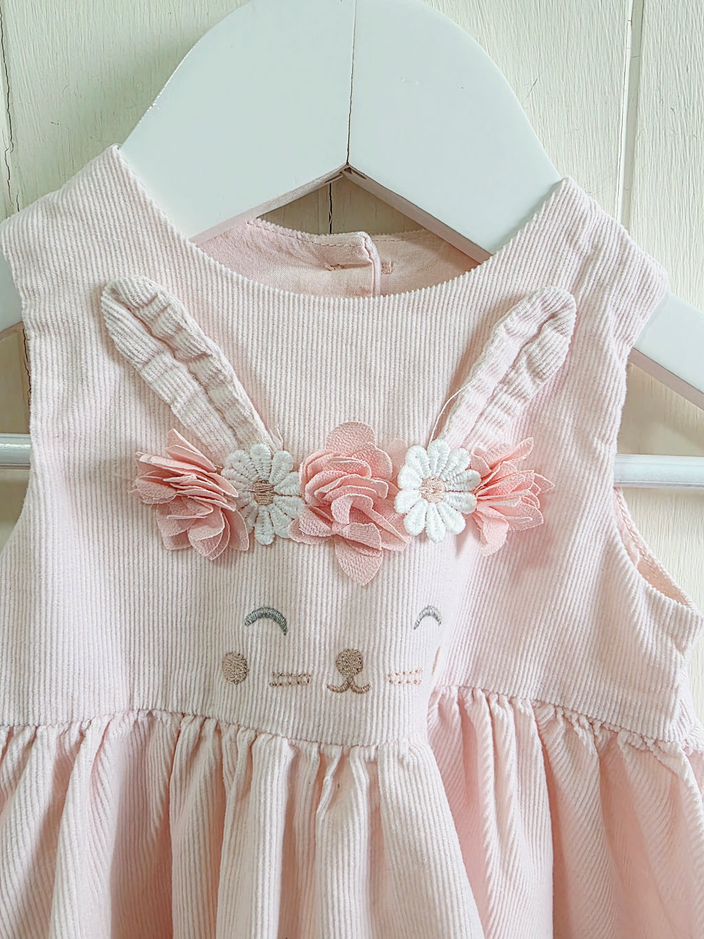Mothercare - pink corduroy baby dress with floral and bunny embroidery 1-3 months