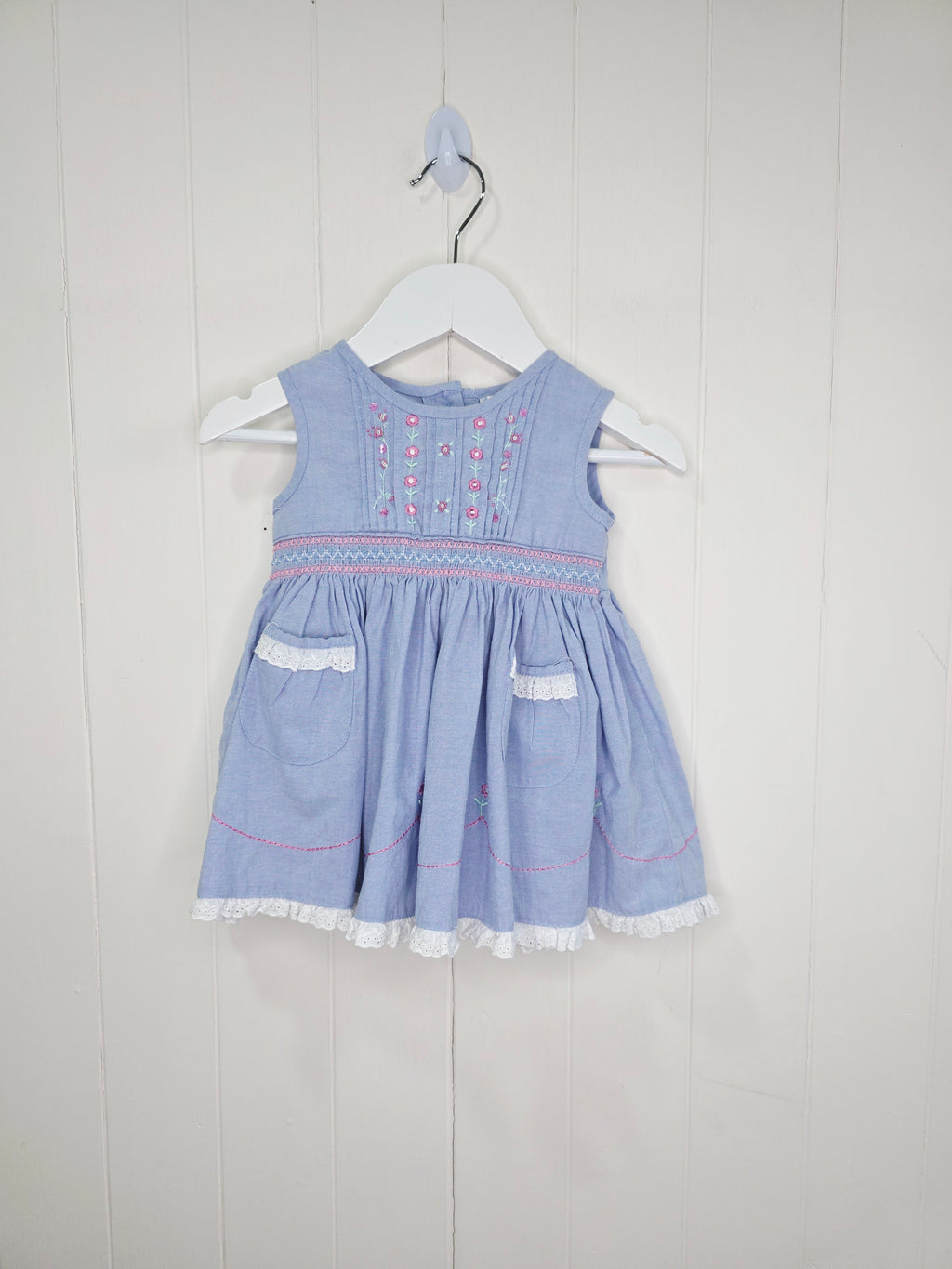 Ladybird - 0-3 months blue baby dress with pink embroidery and smocking details on the bodice