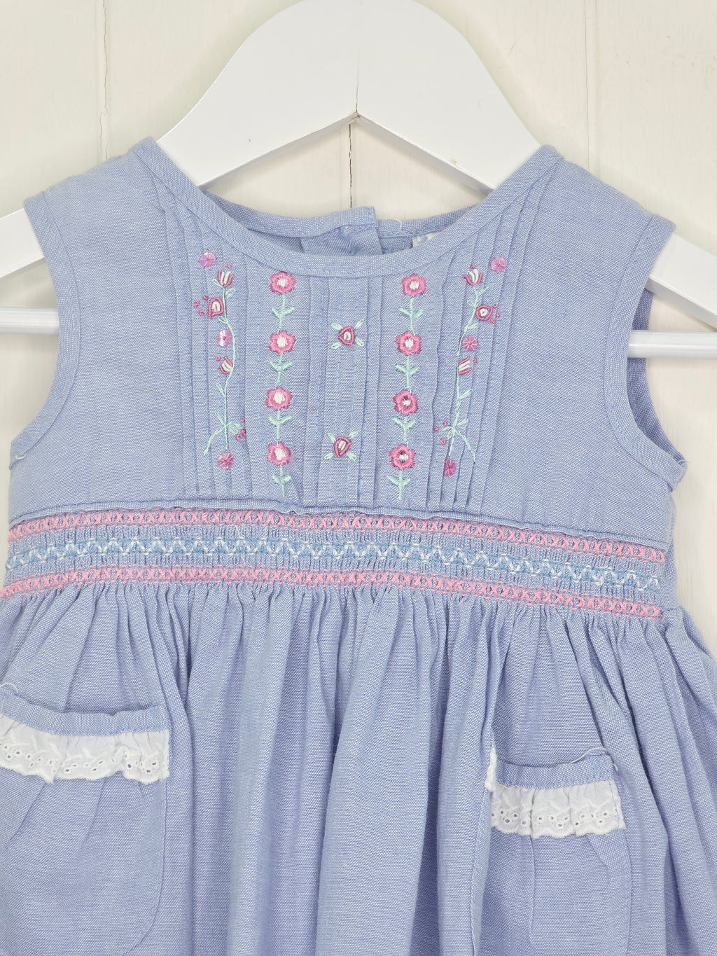 Ladybird - 0-3 months blue baby dress with pink embroidery and smocking details on the bodice