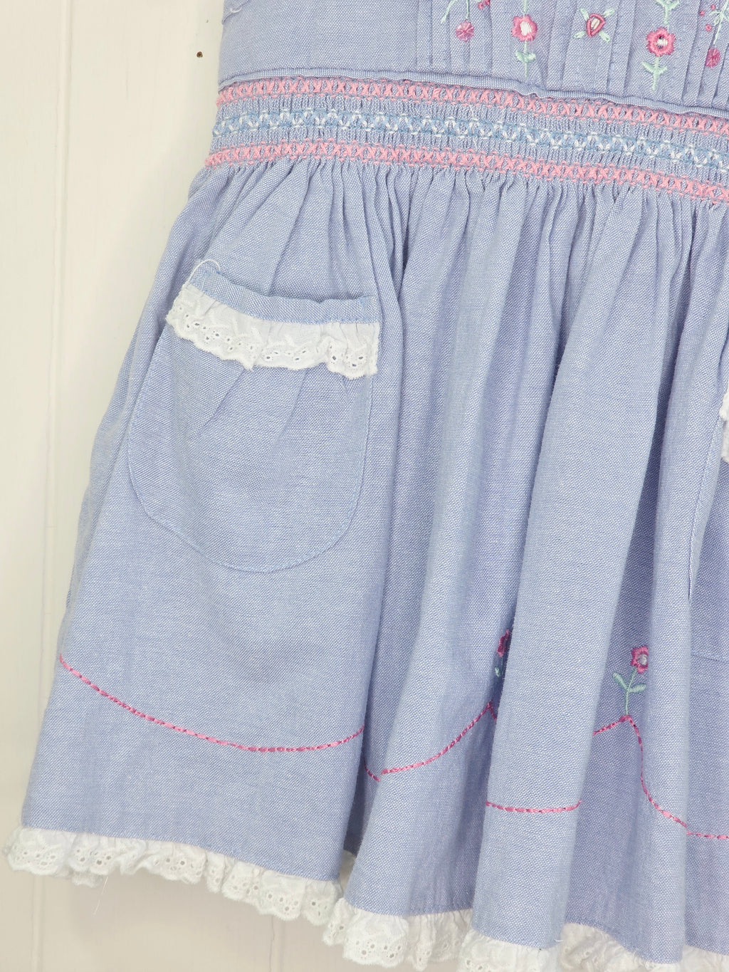Ladybird - 0-3 months blue baby dress with pink embroidery and smocking details on the bodice