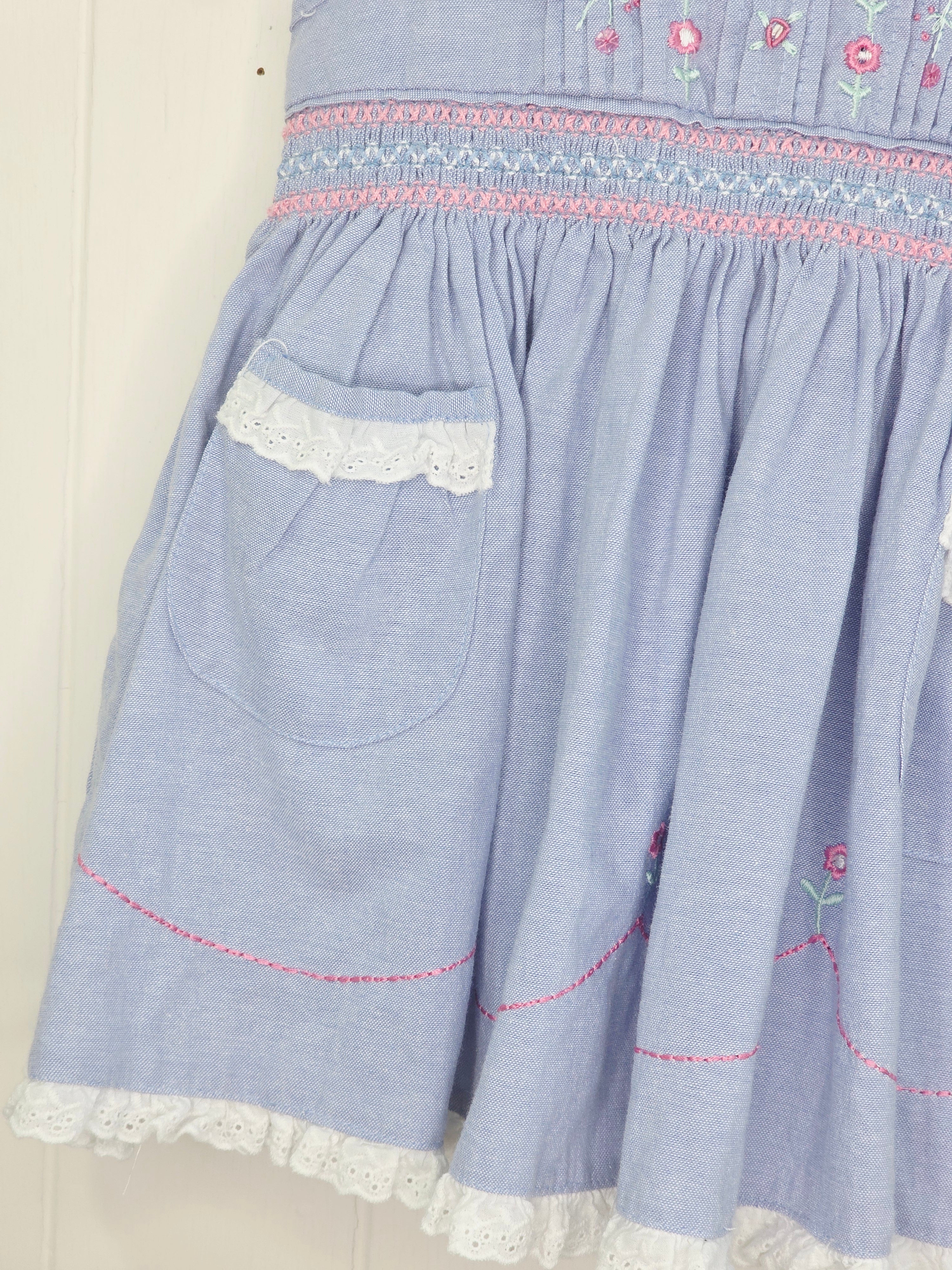 Ladybird - 0-3 months blue baby dress with pink embroidery and smocking details on the bodice