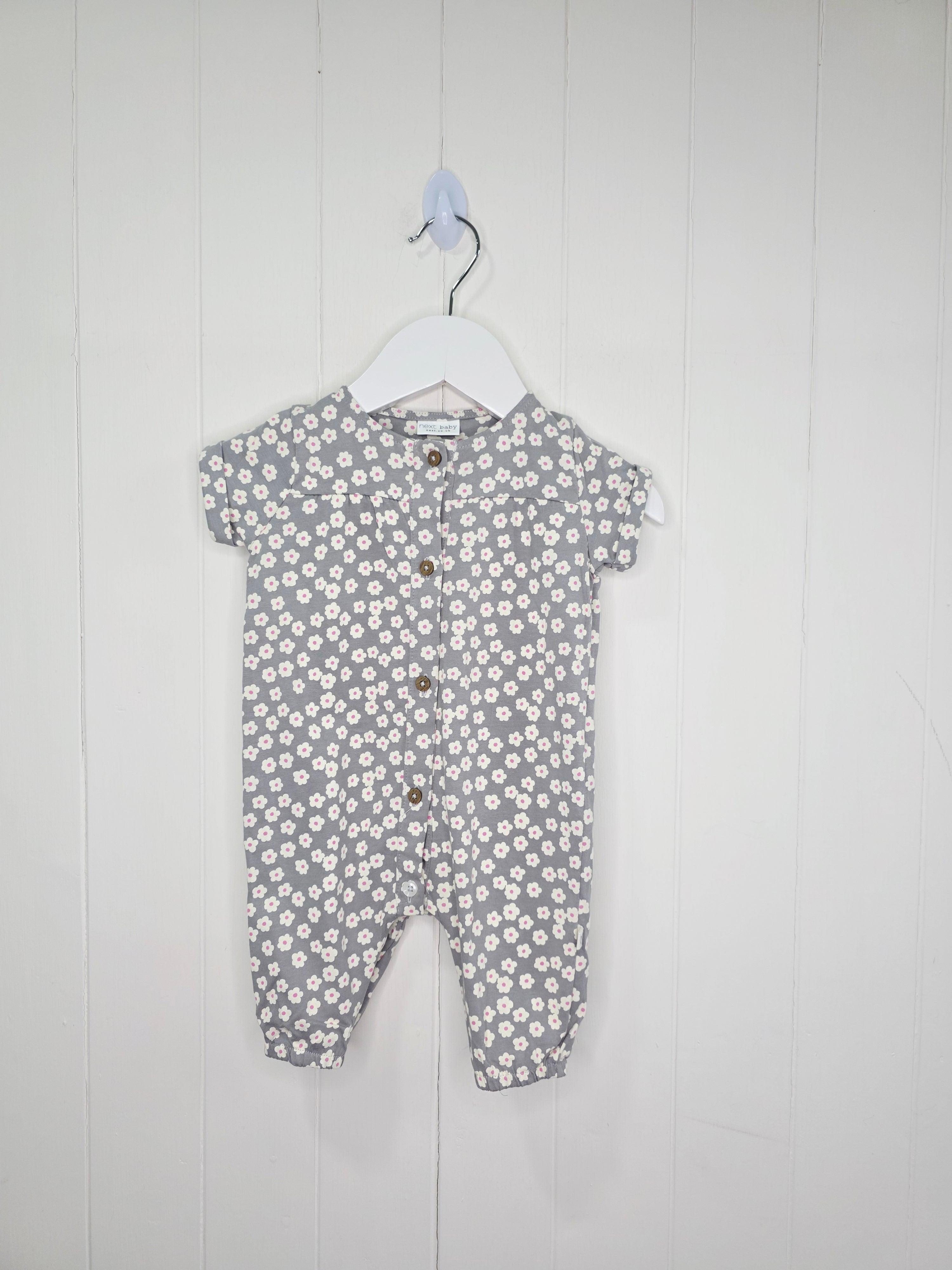 Next - up to 3 months girls romper featuring a grey floral print