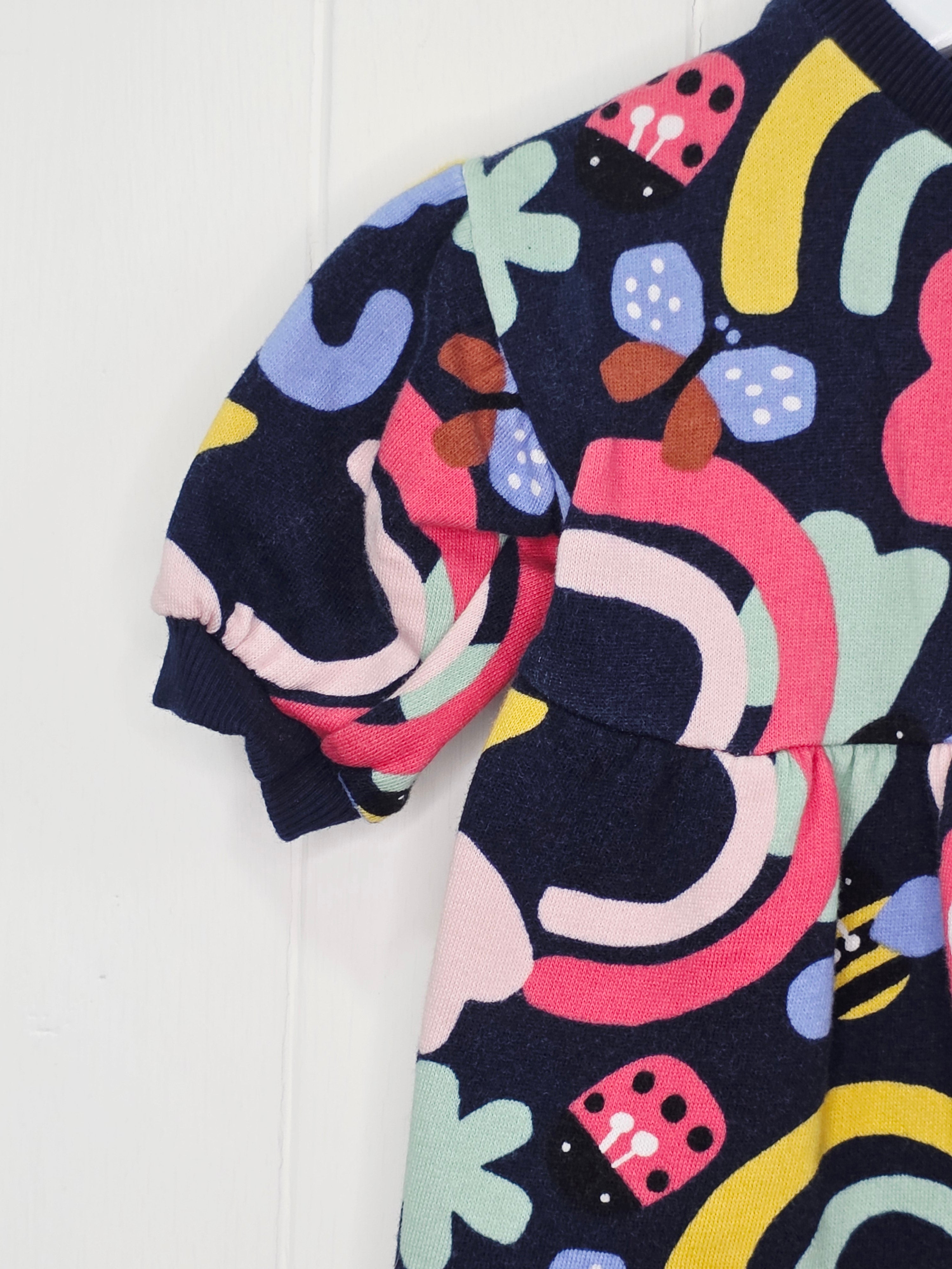 F&F - up to 1 month girls navy blue long-sleeved dress featuring a colorful abstract rainbow and floral print