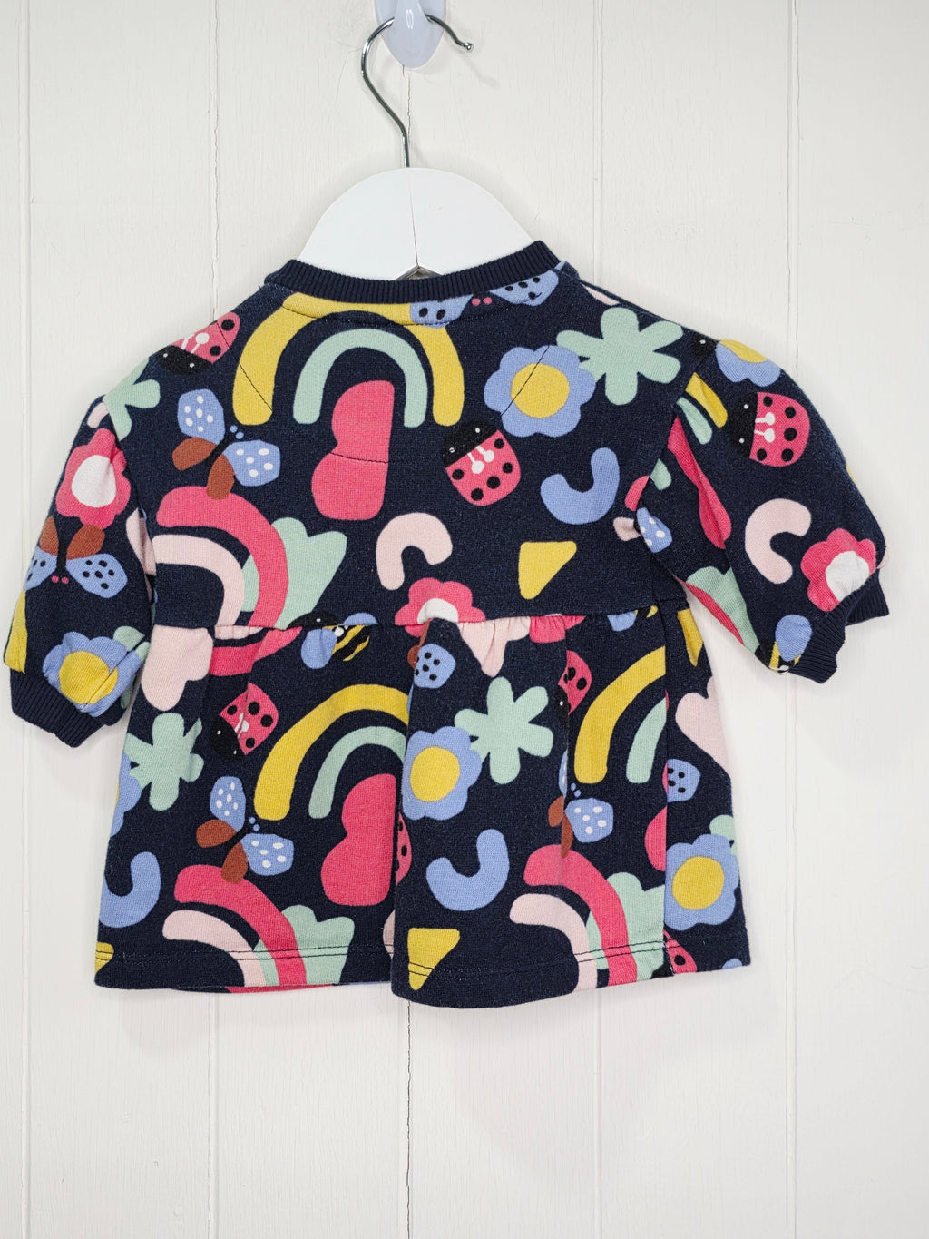 F&F - up to 1 month girls navy blue long-sleeved dress featuring a colorful abstract rainbow and floral print