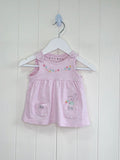 Nutmeg - newborn baby girls pink pinafore dress with a flowers and buny print