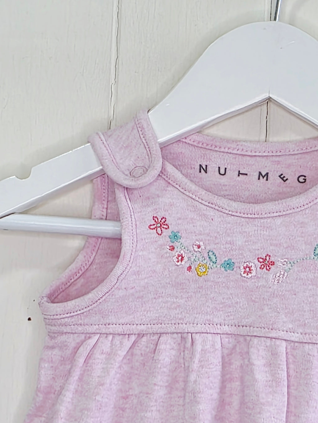 Nutmeg - newborn baby girls pink pinafore dress with a flowers and buny print