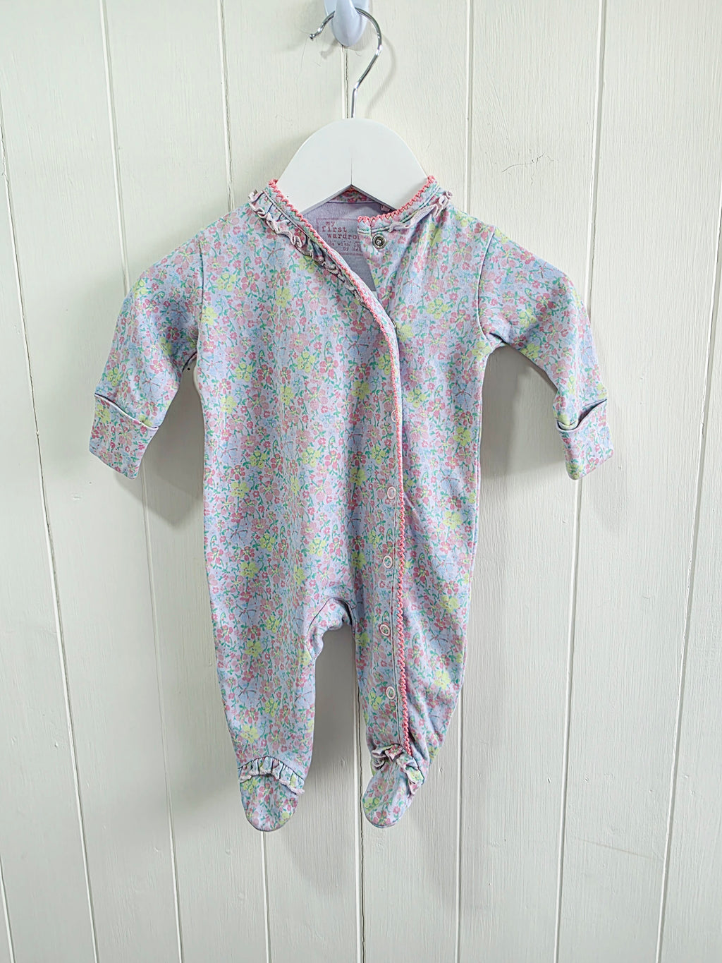 Next - Up to 1 month floral sleepsuit featuring popper closure and frill details