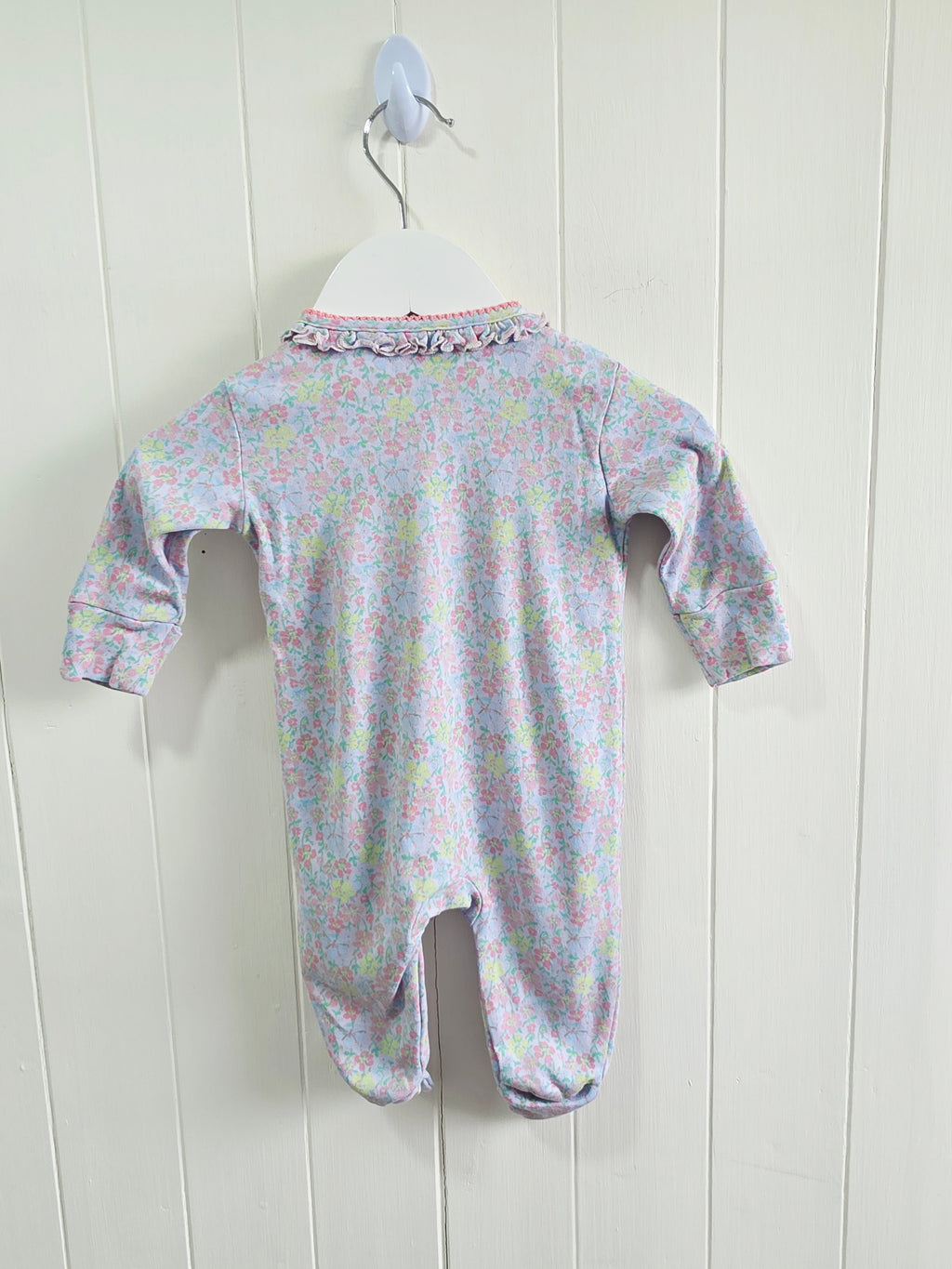 Next - Up to 1 month floral sleepsuit featuring popper closure and frill details
