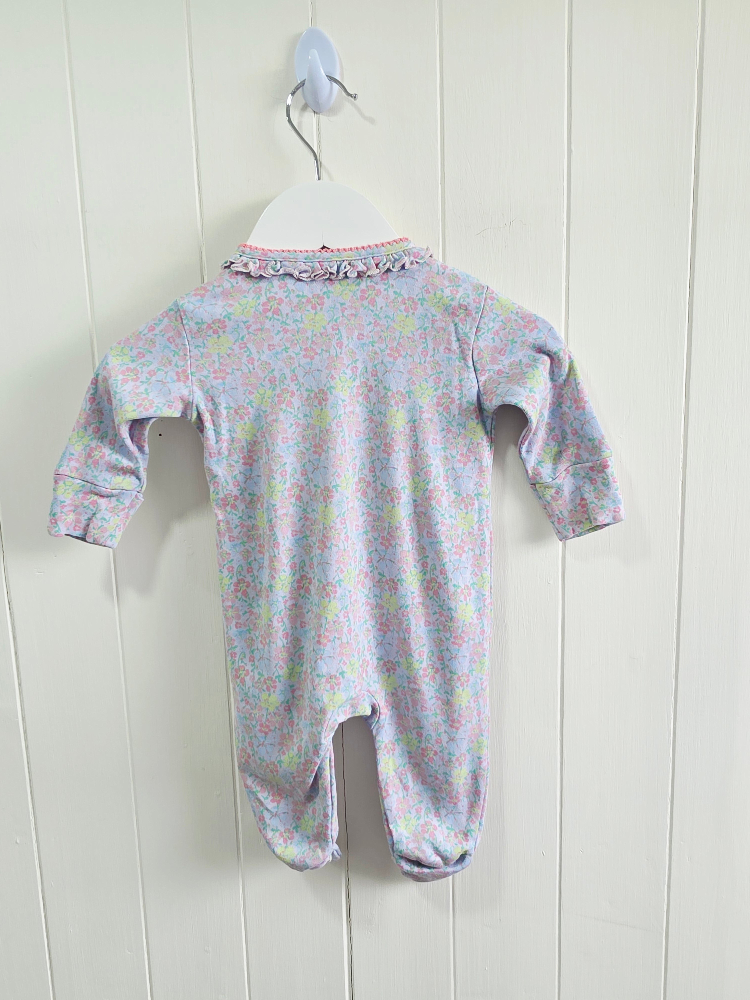 Next - Up to 1 month floral sleepsuit featuring popper closure and frill details