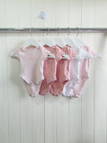 Primark - Up to 1 month 5-Pack short sleeve girls bodysuits featuring hearts and bows
