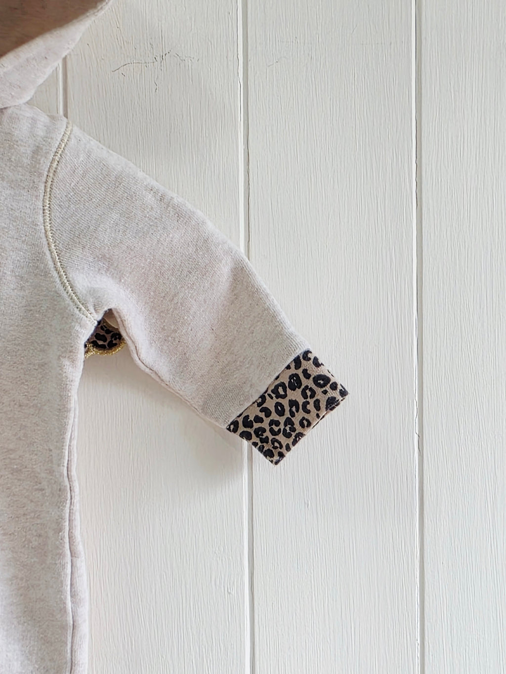 River Island - 0-1 month girls hooded cream all in one romper featuring leopard print wings
