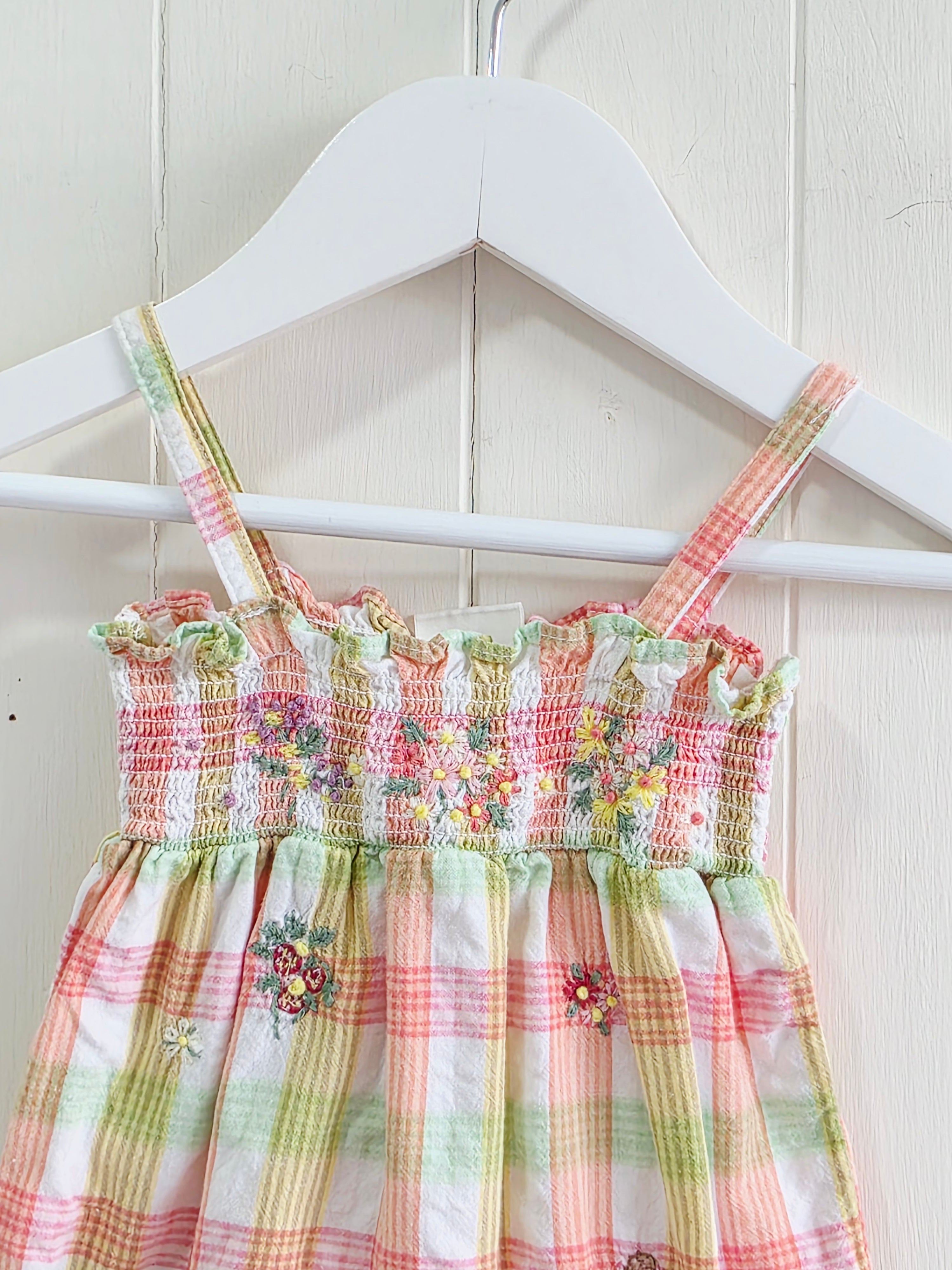 Next - Up to 1 month girls romper featuring a pink and green gingham plaid pattern with embroidered bunny and floral details