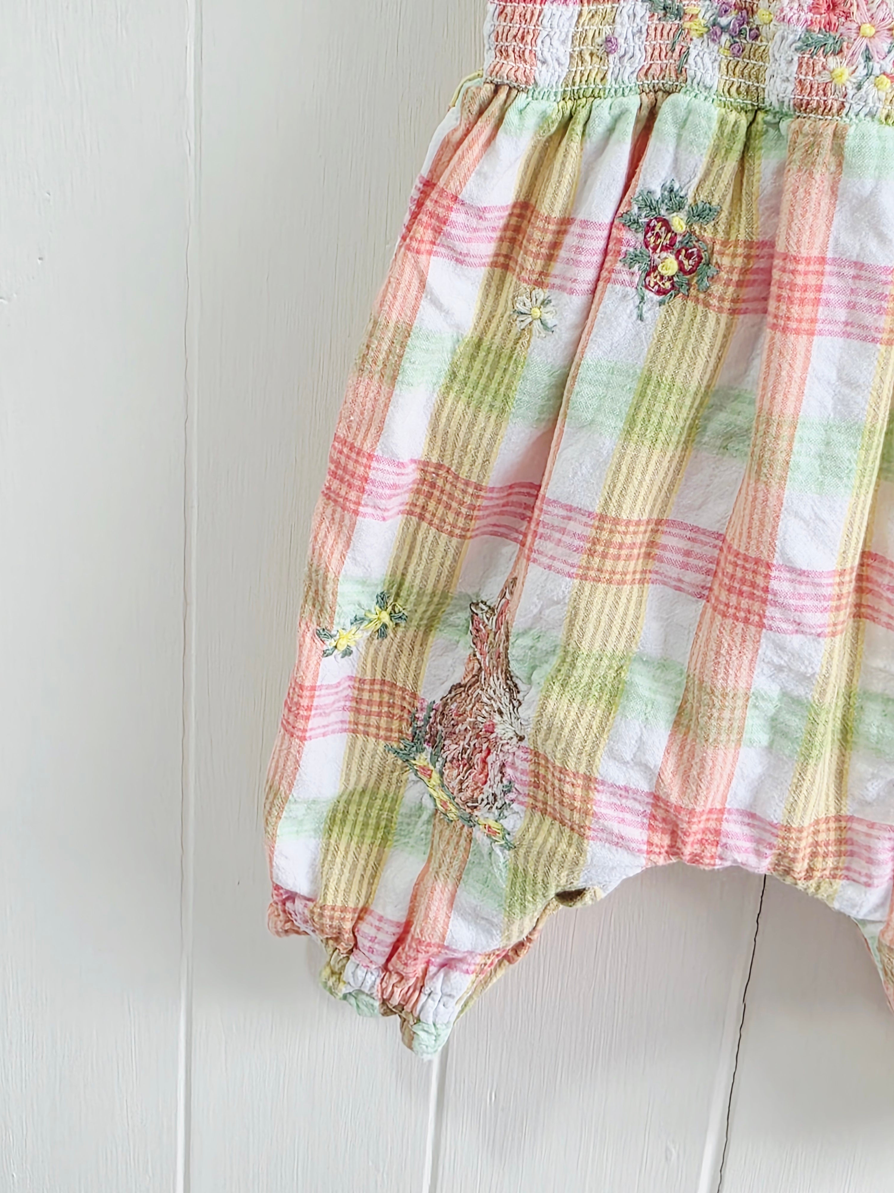 Next - Up to 1 month girls romper featuring a pink and green gingham plaid pattern with embroidered bunny and floral details