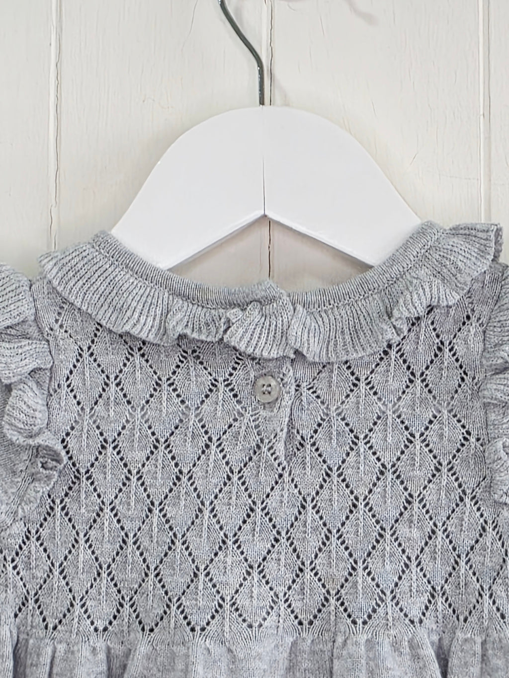 Next - up to 3 months grey knit sweater dress featuring a ruffled collar and diamond-patterned bodice