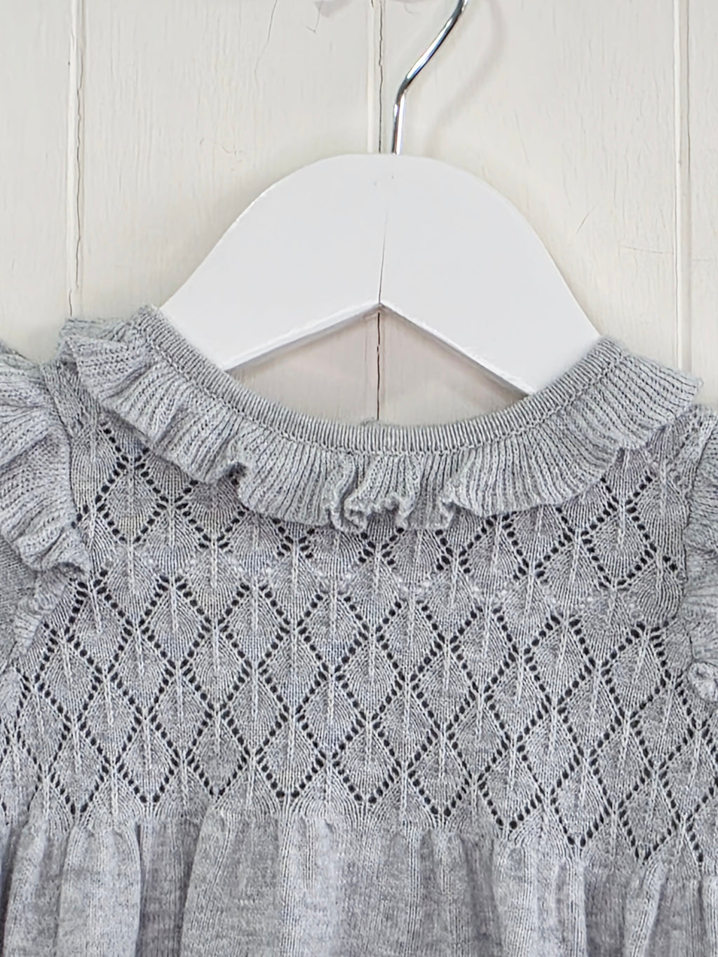 Next - up to 3 months grey knit sweater dress featuring a ruffled collar and diamond-patterned bodice