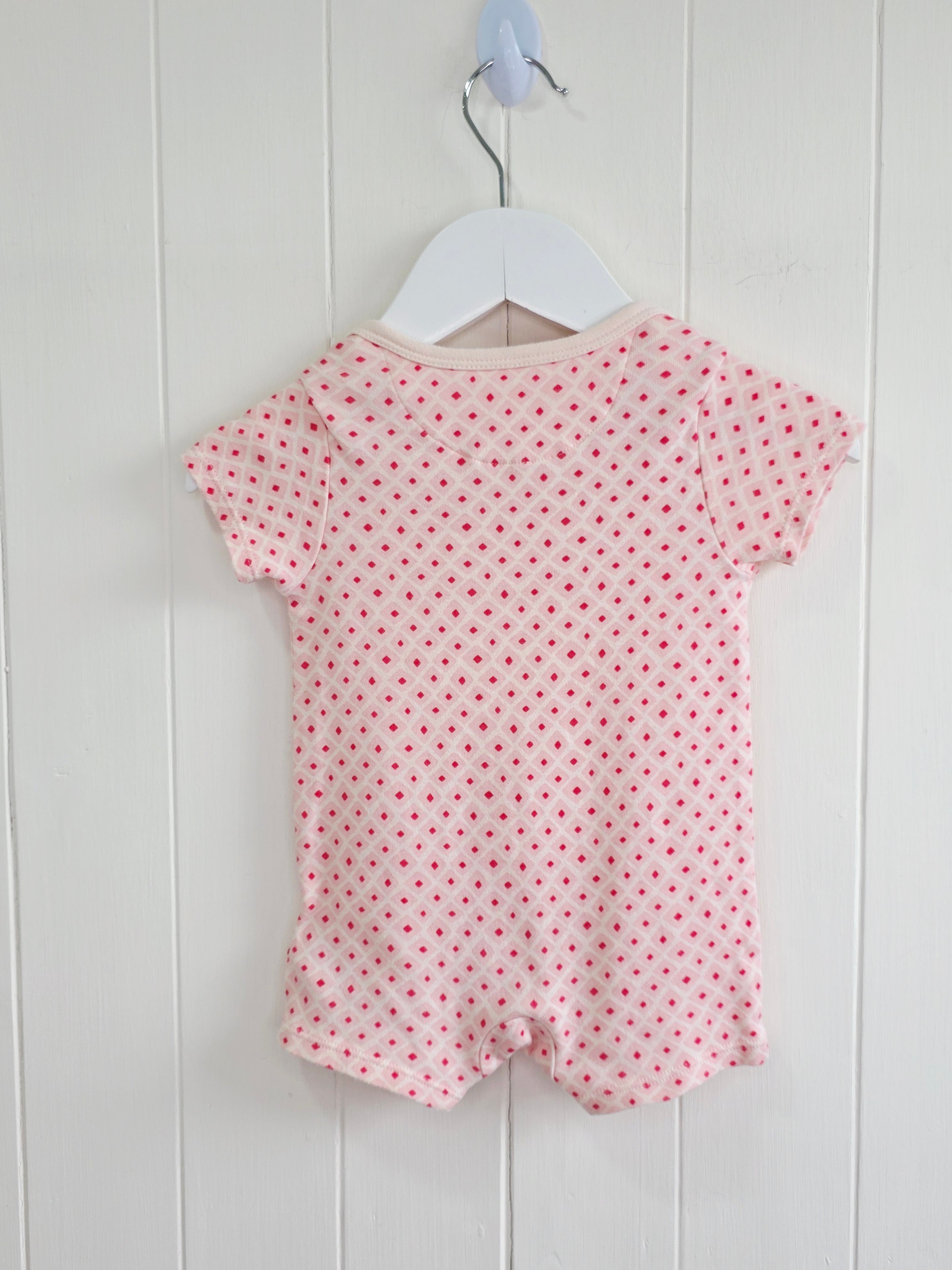 M&S - 0-3 months diamond pattern pink romper
