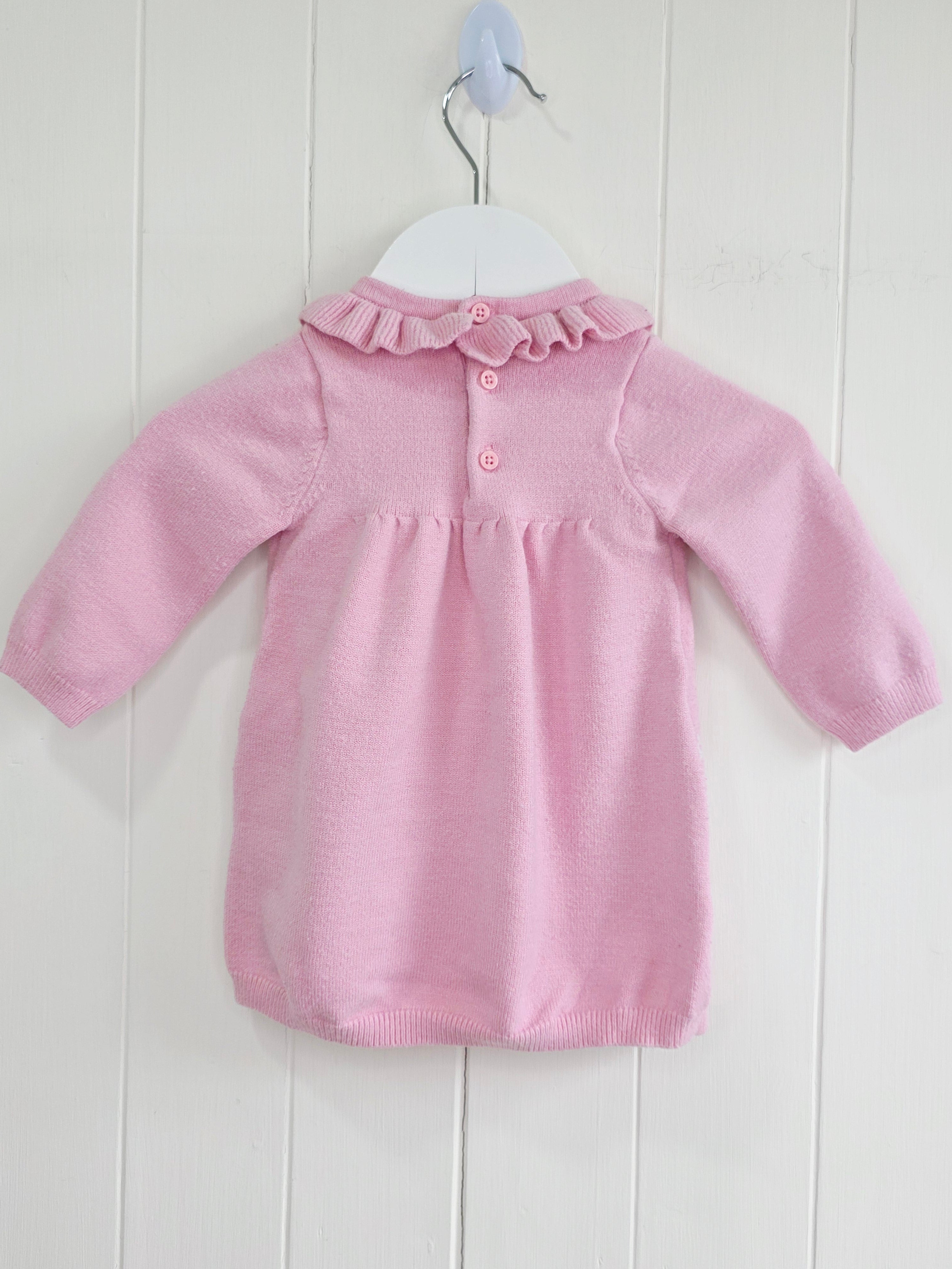 Nutmeg - 0-3 months pink knitted bunny dress featuring a ruffled neckline