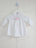Nutmeg - 0-3 months white knitted dress featuring embroidered fairy details and Peter Pan collar