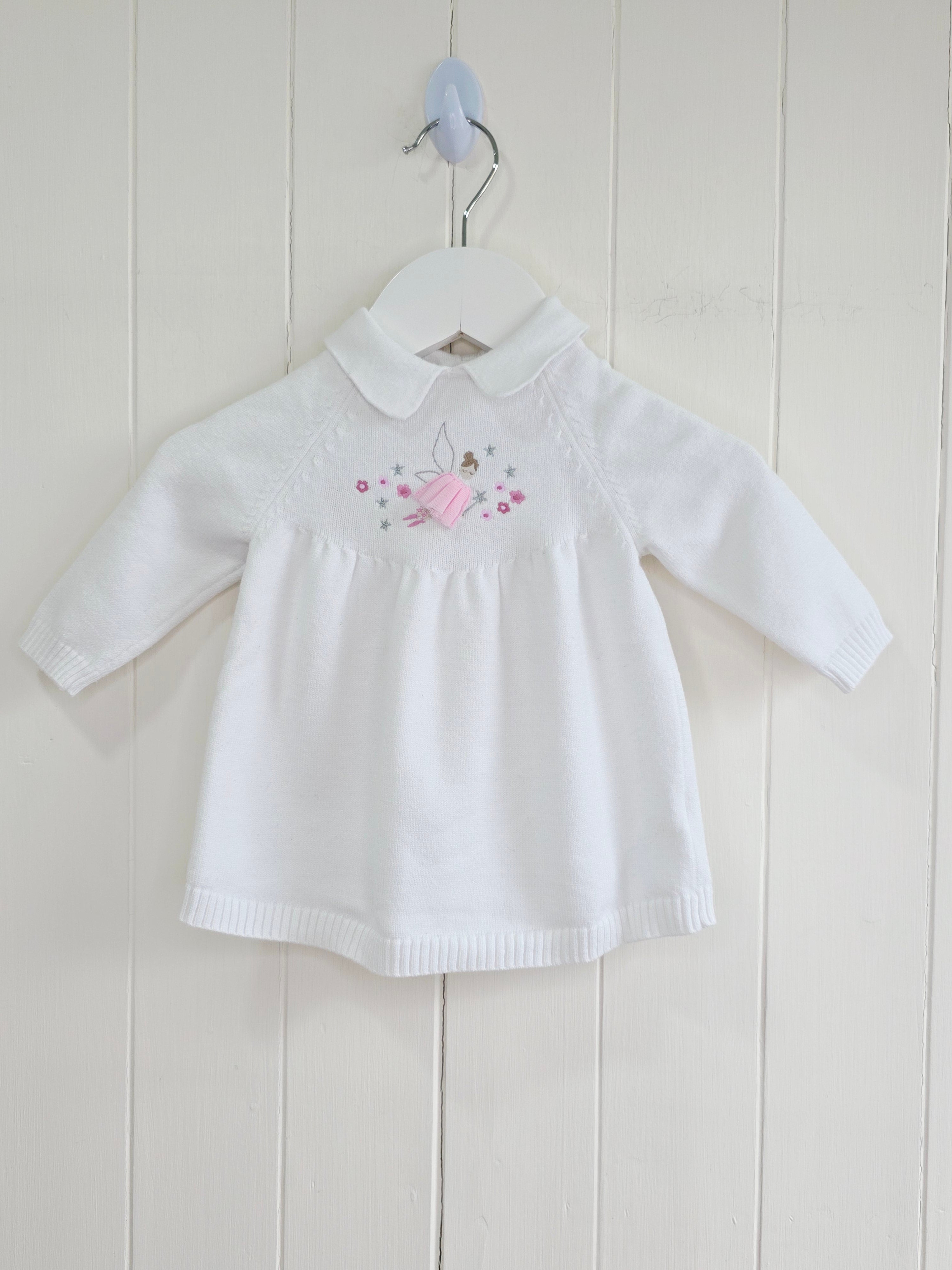 Nutmeg - 0-3 months white knitted dress featuring embroidered fairy details and Peter Pan collar