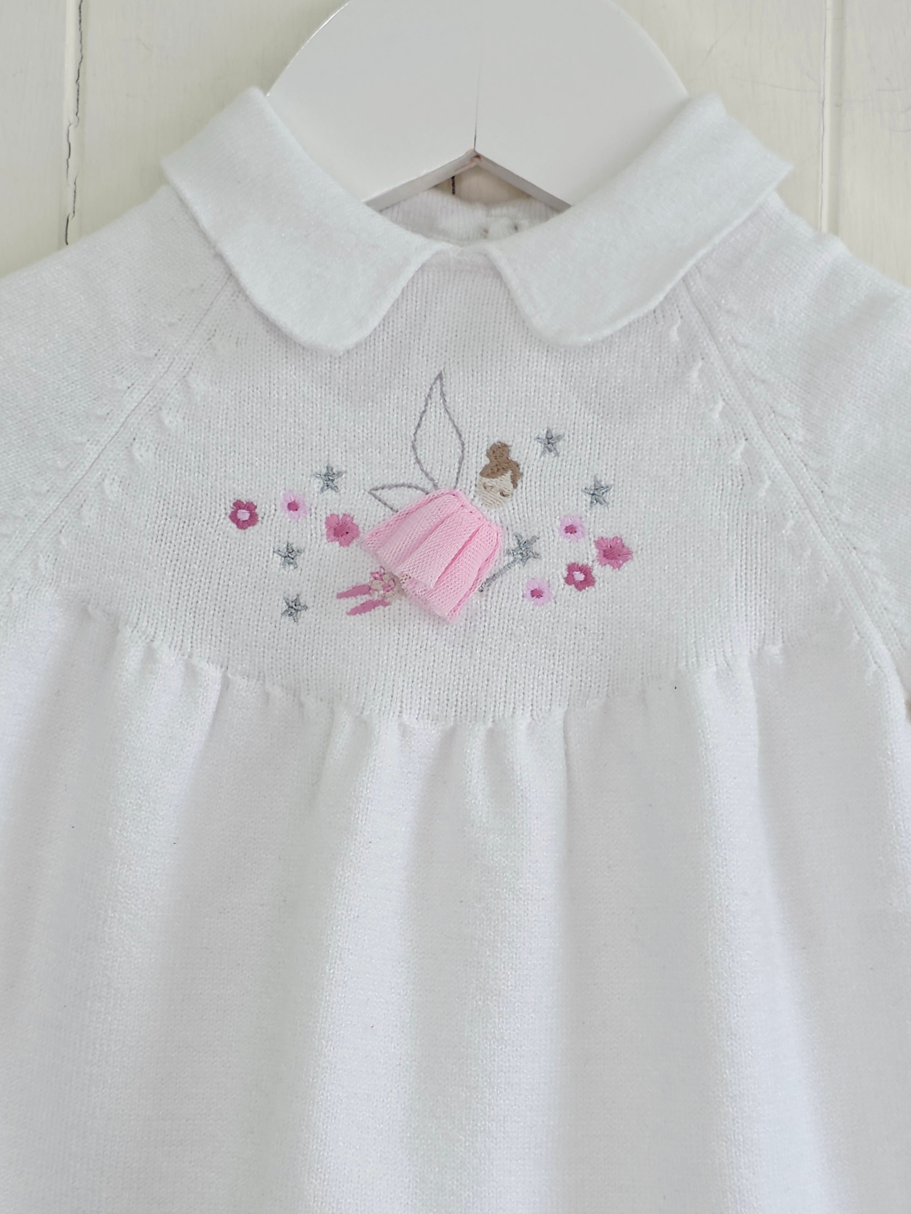 Nutmeg - 0-3 months white knitted dress featuring embroidered fairy details and Peter Pan collar