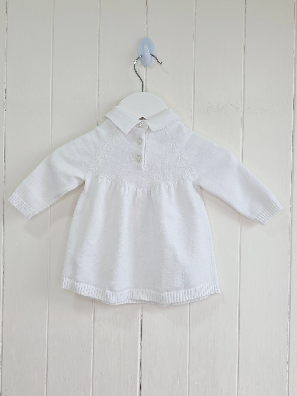Nutmeg - 0-3 months white knitted dress featuring embroidered fairy details and Peter Pan collar