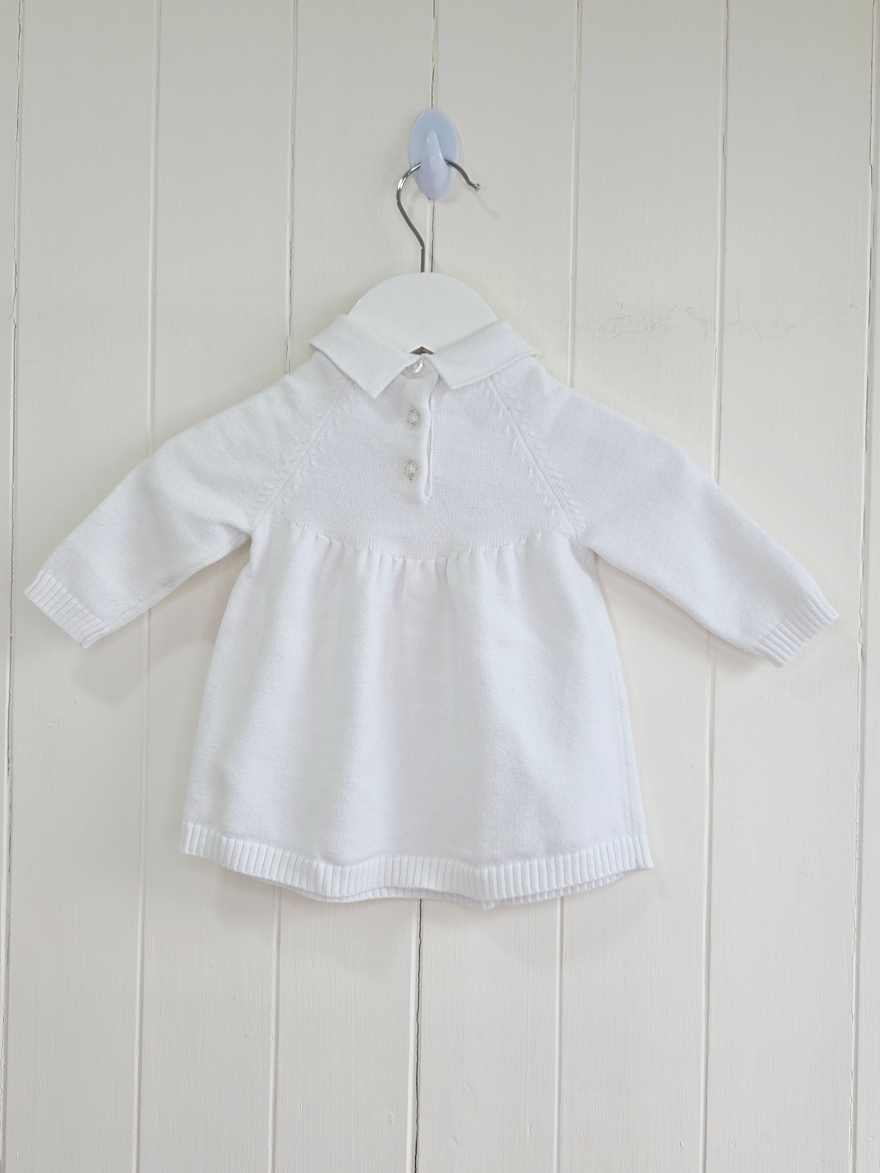 Nutmeg - 0-3 months white knitted dress featuring embroidered fairy details and Peter Pan collar