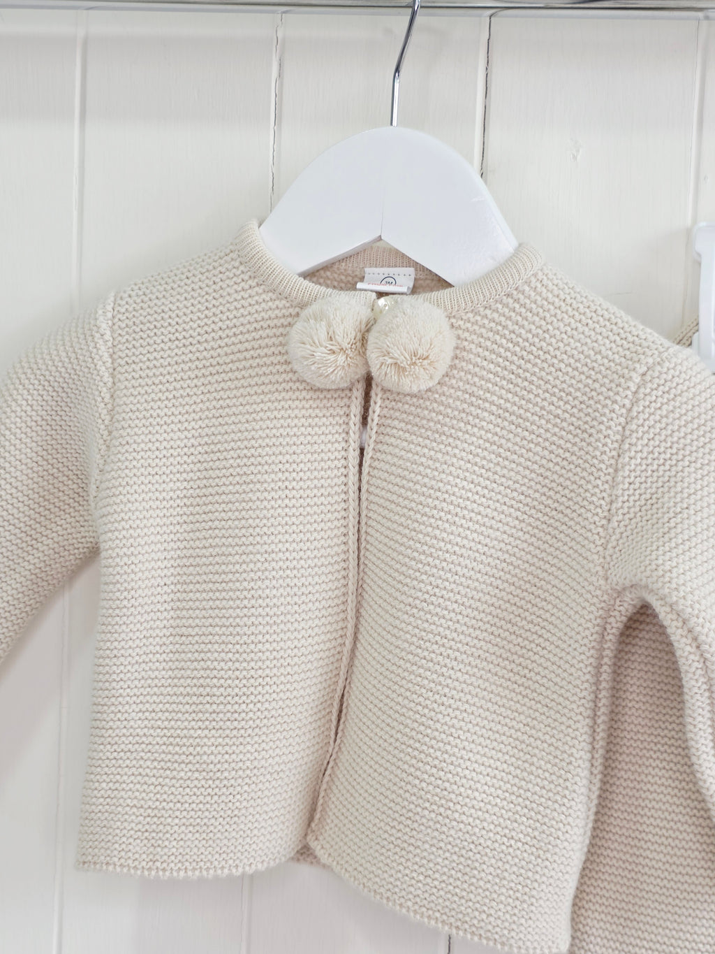 Dandelion - 3 months beige knitted pom pom outfit is a two-piece baby set featuring a cardigan and footed leggings