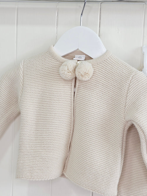 Dandelion - 3 months beige knitted pom pom outfit is a two-piece baby set featuring a cardigan and footed leggings