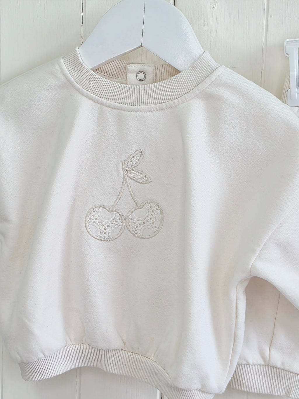 George - 0-3 months cream sweatshirt and joggers set features a broderie cherry embroidered design