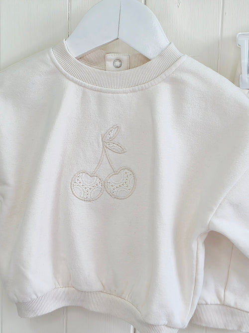 George - 0-3 months cream sweatshirt and joggers set features a broderie cherry embroidered design