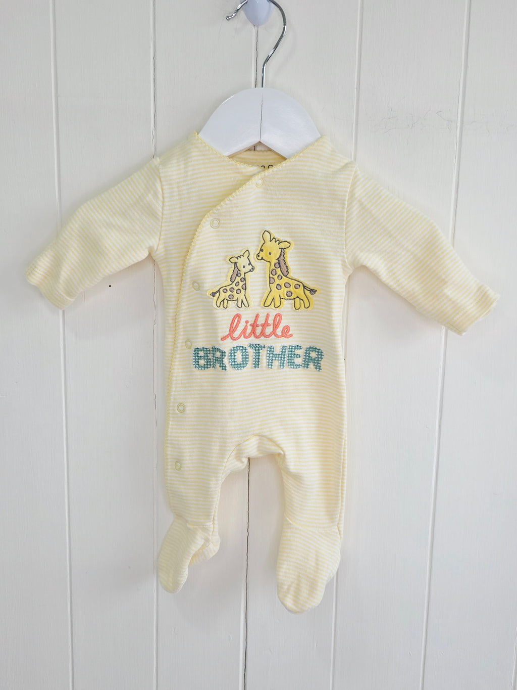 M&S - Newborn "Little brother" yellow sleepsuit featuring giraffe applique