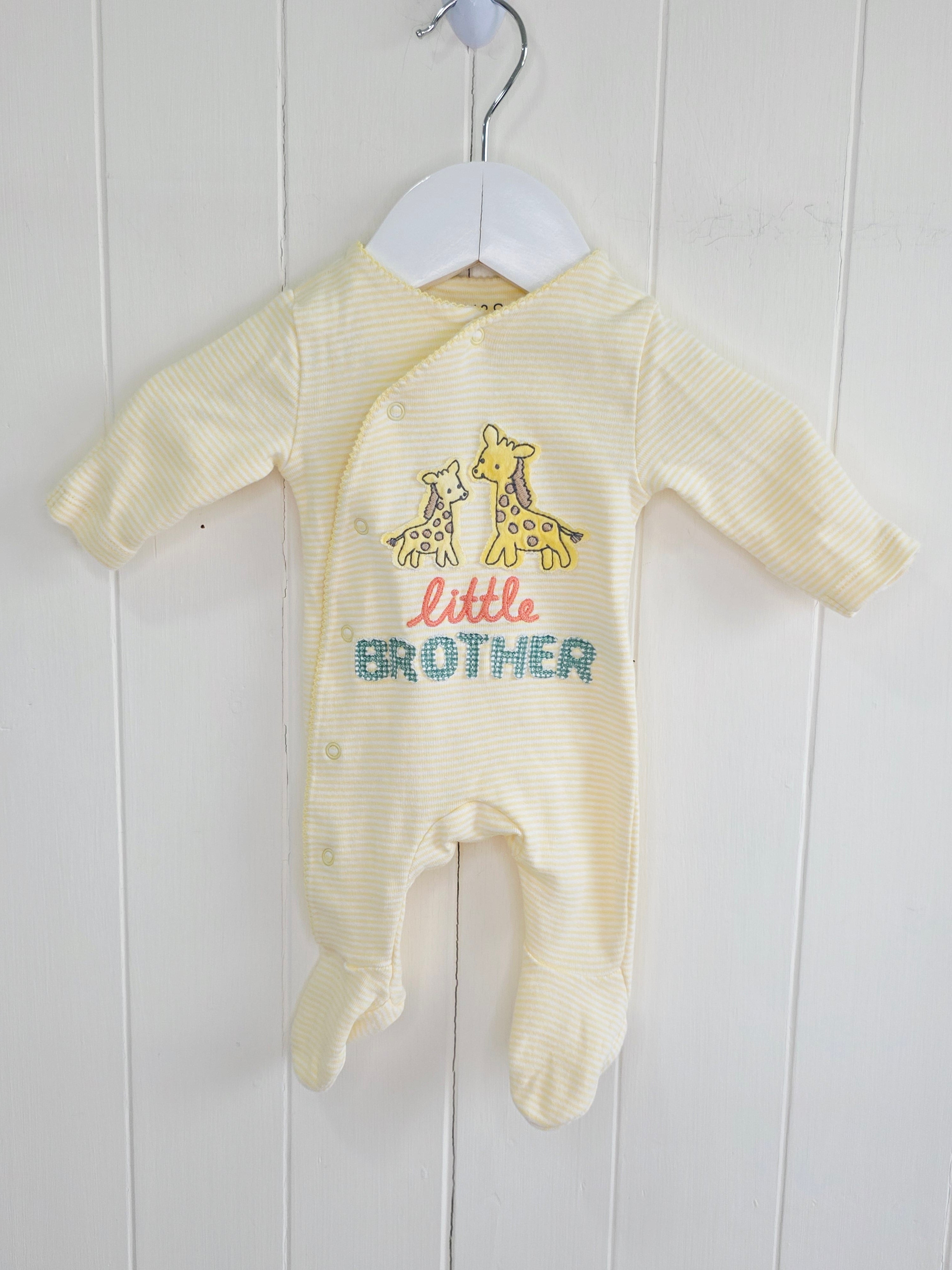 M&S - Newborn "Little brother" yellow sleepsuit featuring giraffe applique