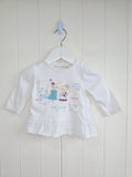 Nutmeg - 0-3 months white top features detailed "little friends" bunny embroidery and a lace-trimmed hem