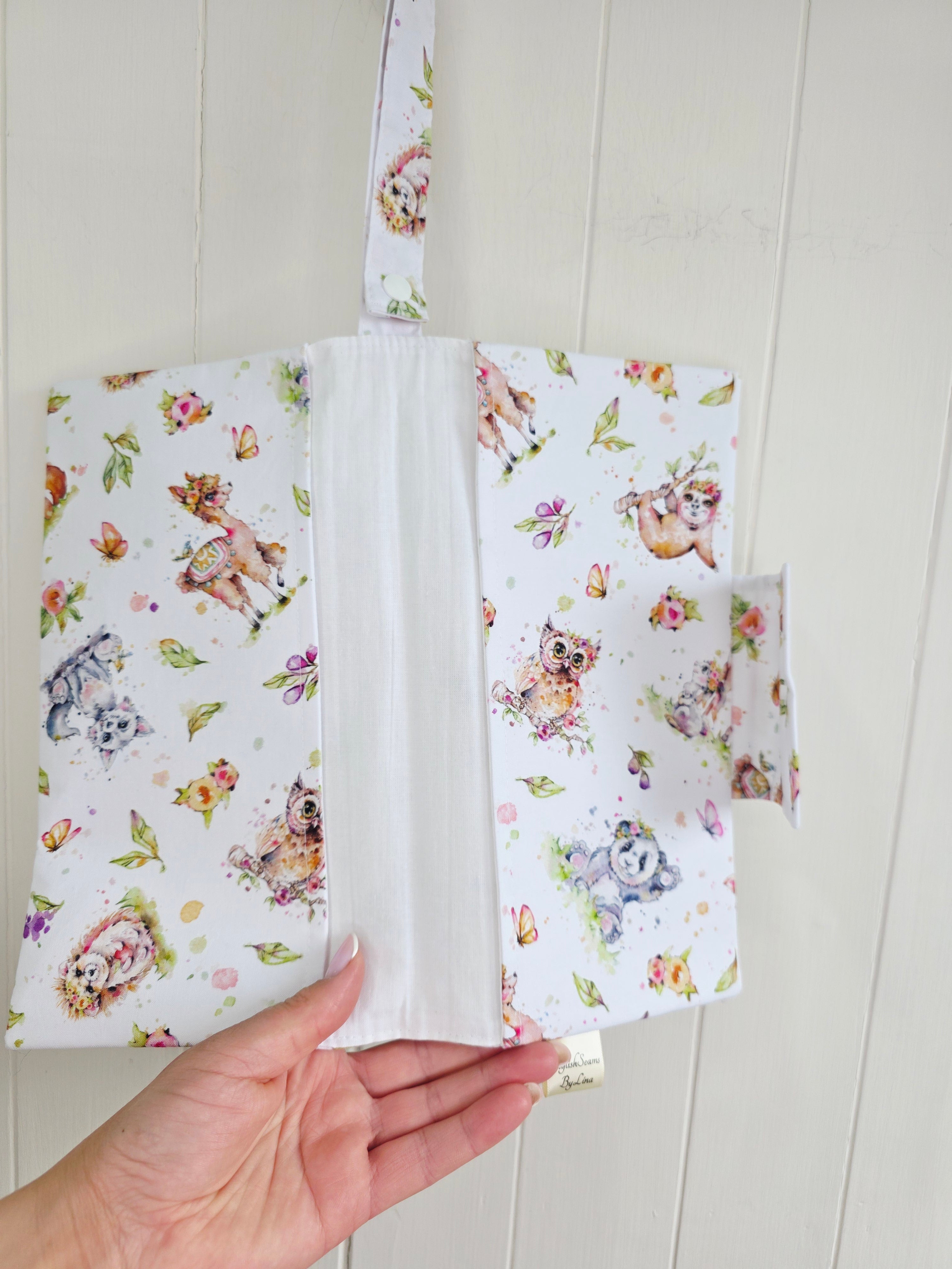 Handmade - mini nappies and wet wipes wallet/pouch featuring playful animal print