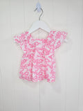 Leigh Tucker - 3-6 months white and pink floral cotton top featuring ruffle sleeves