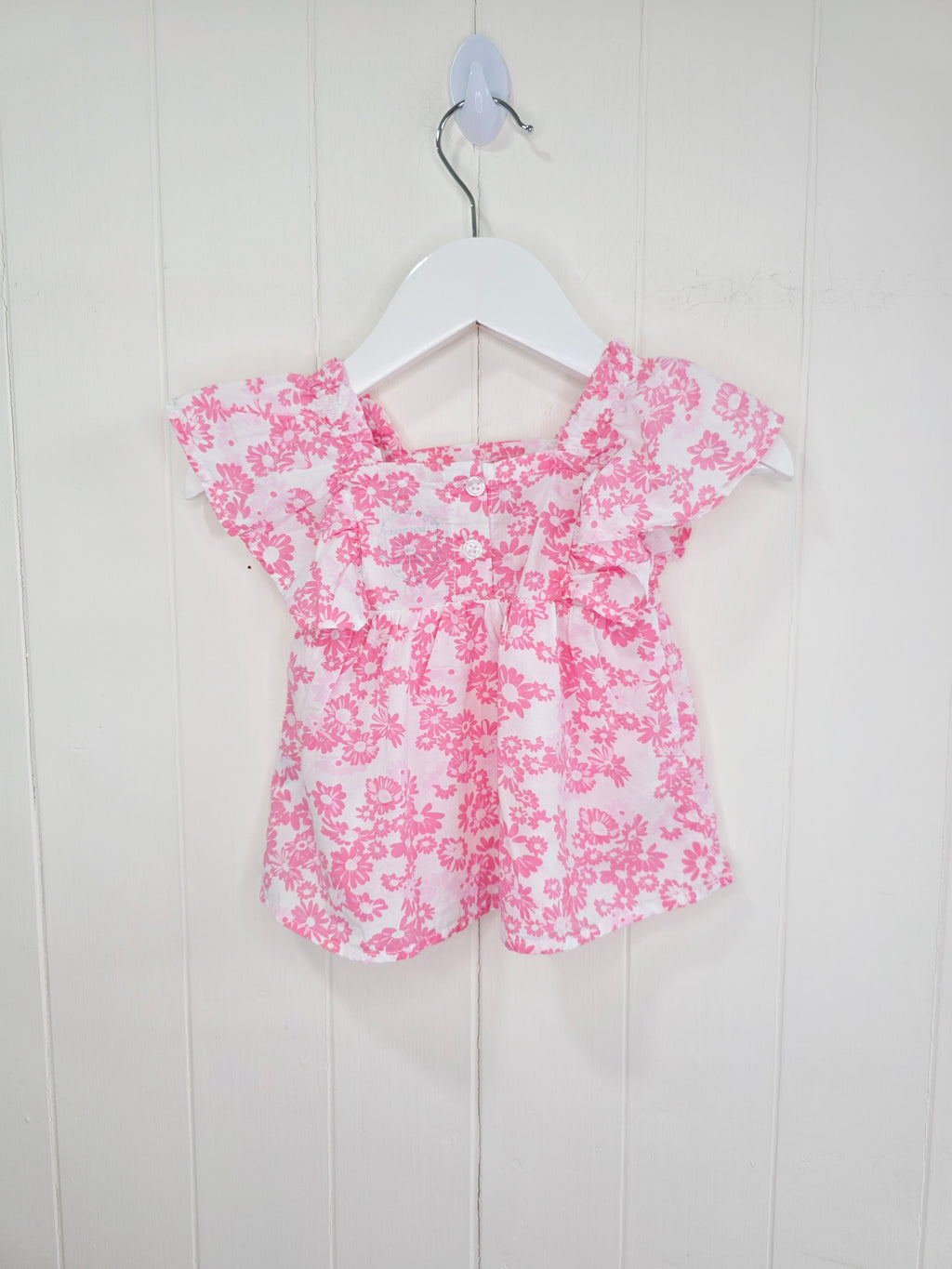 Leigh Tucker - 3-6 months white and pink floral cotton top featuring ruffle sleeves