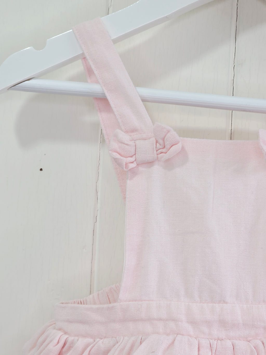 Matalan - 6-9 months plain pink pinafore dress featuring bow and frill details