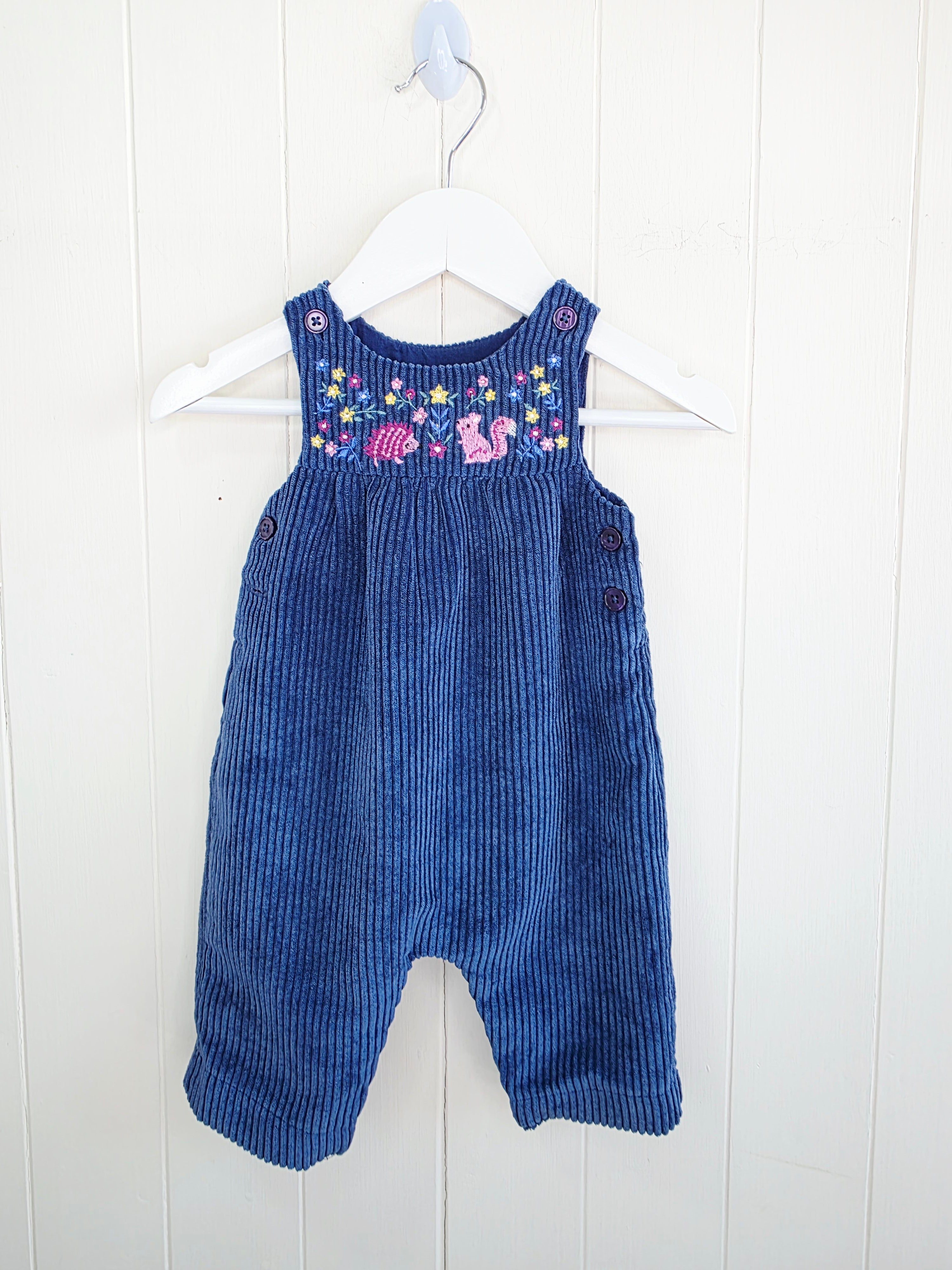 Nutmeg - 3-6 months navy blue corduroy romper features colorful embroidered animal and flower details on the chest