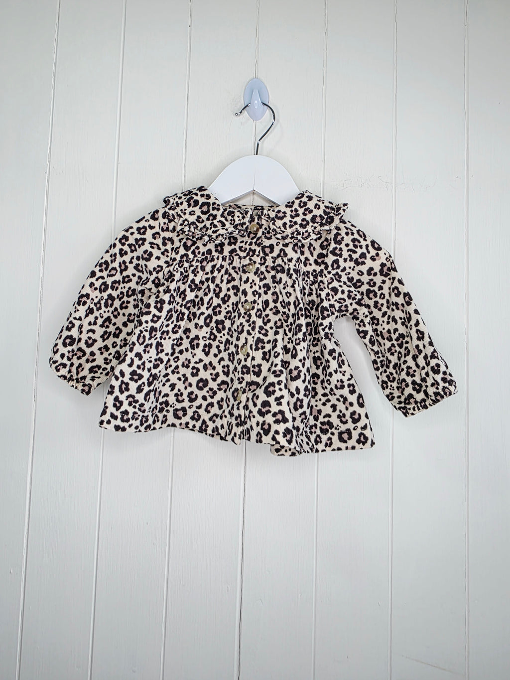 Tu - 3-6 months girls leopard print collared top features a ruffled collar and button-down front