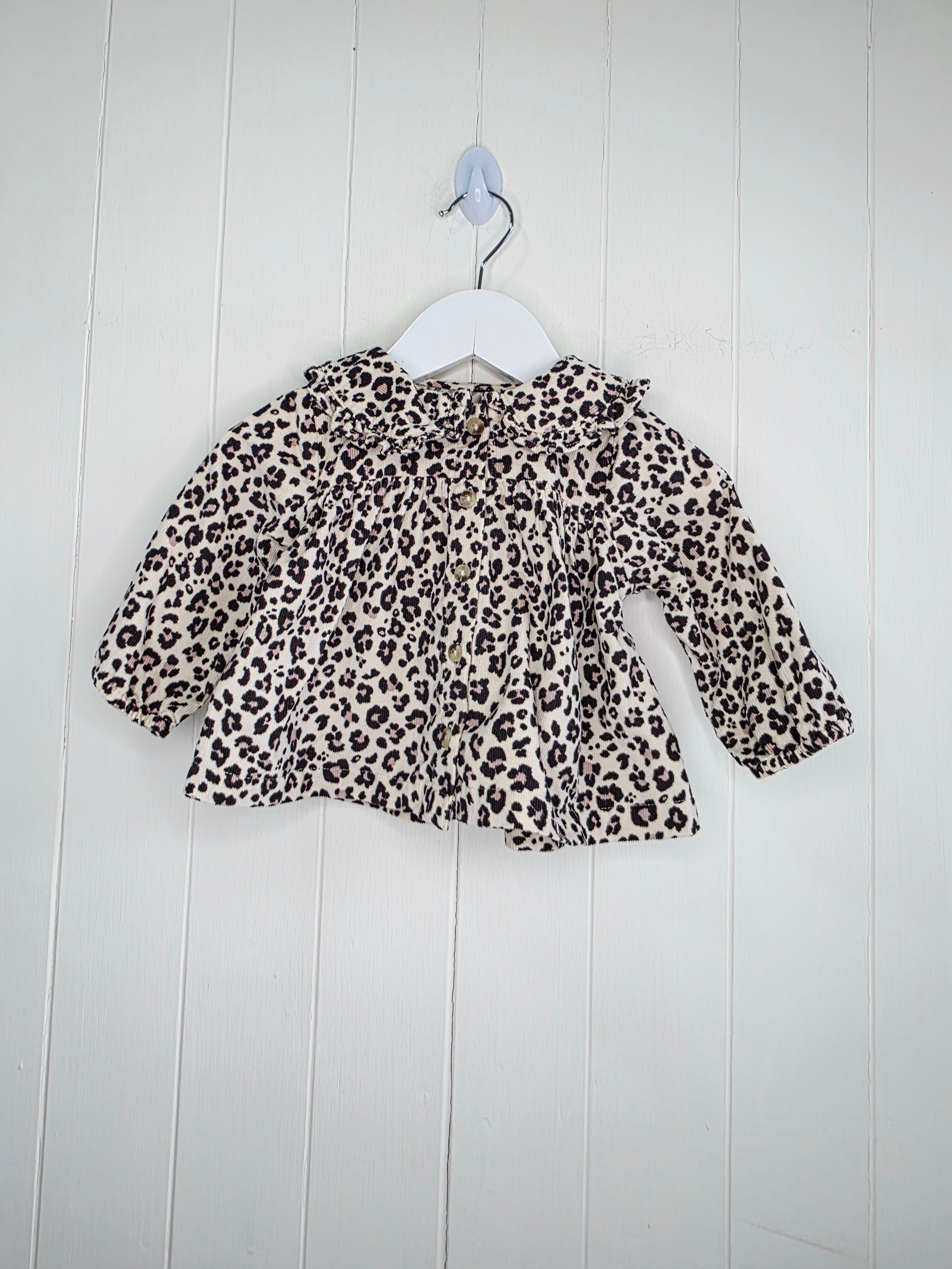 Tu - 3-6 months girls leopard print collared top features a ruffled collar and button-down front