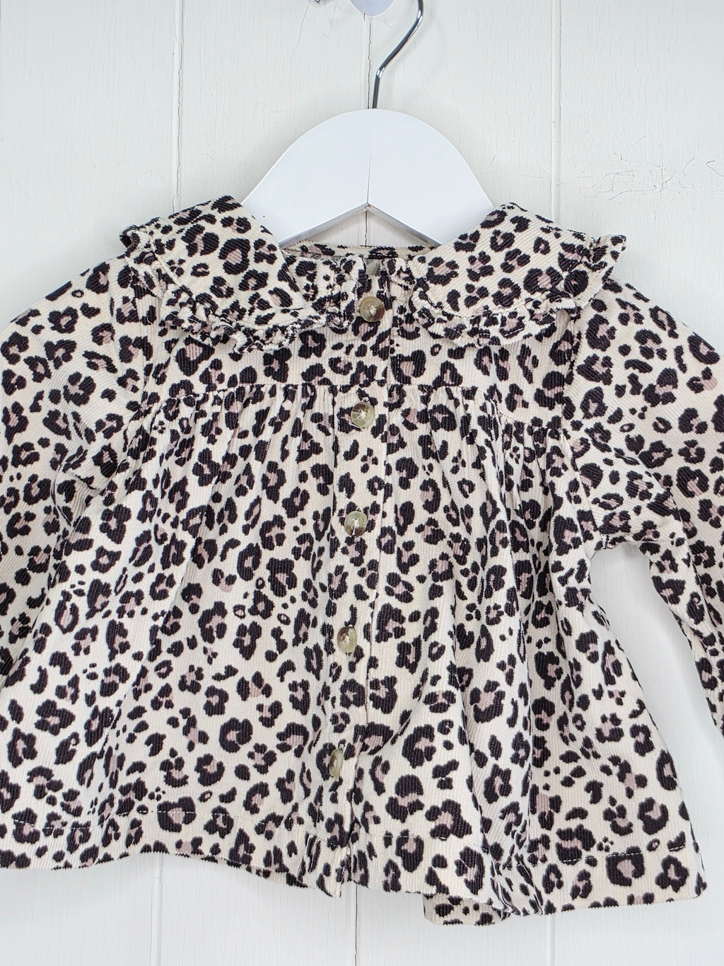 Tu - 3-6 months girls leopard print collared top features a ruffled collar and button-down front