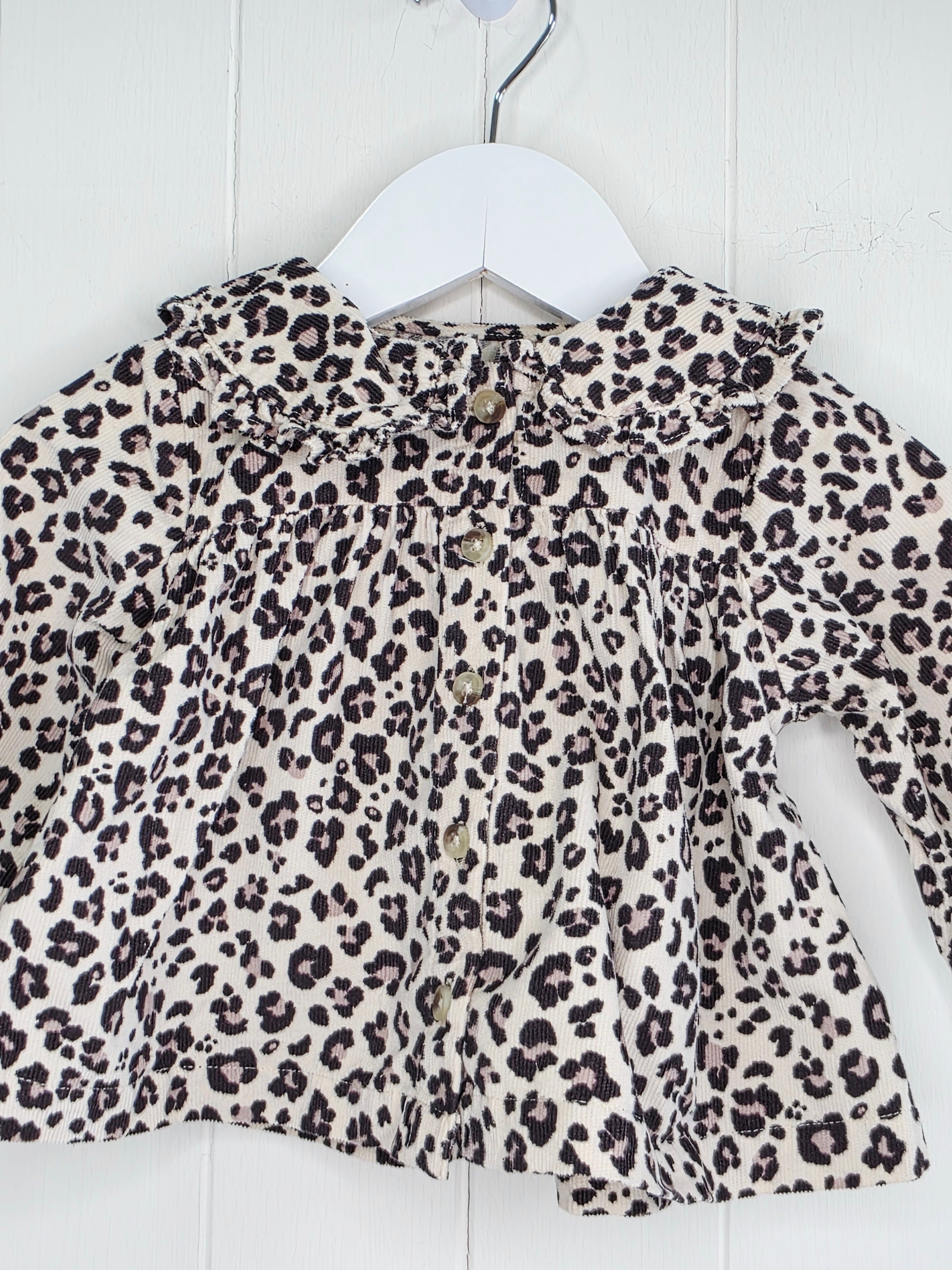 Tu - 3-6 months girls leopard print collared top features a ruffled collar and button-down front