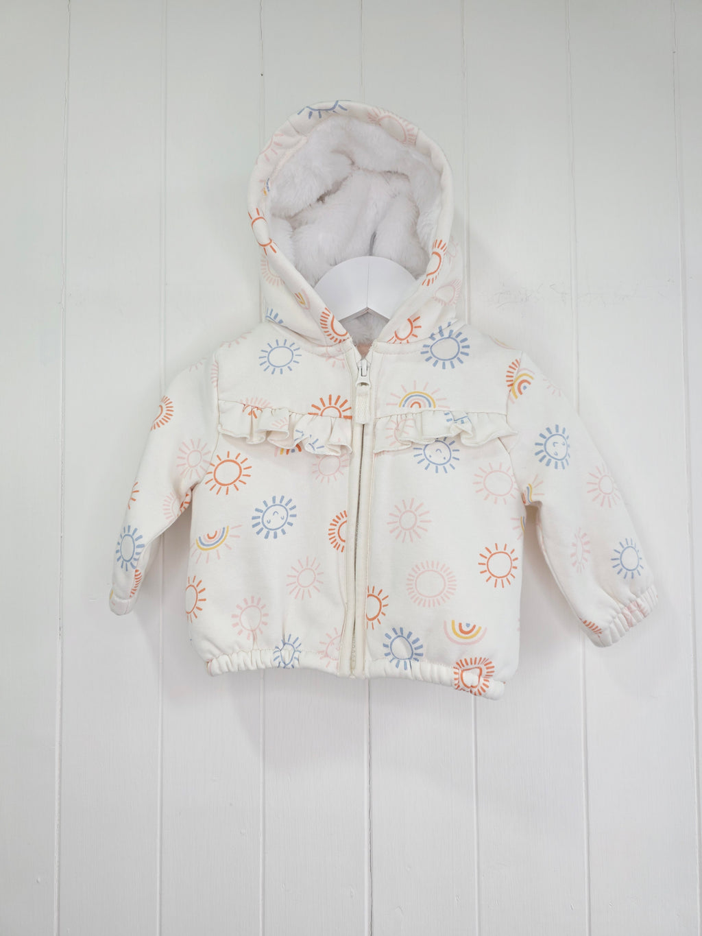 Nutmeg - 3-6 months girls cream hooded jacket featuring faux fur lining and rainbow print