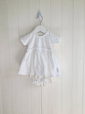 Polarn O. Pyret - 4-6 months girls white bodysuit dress featuring broiderie anglaise